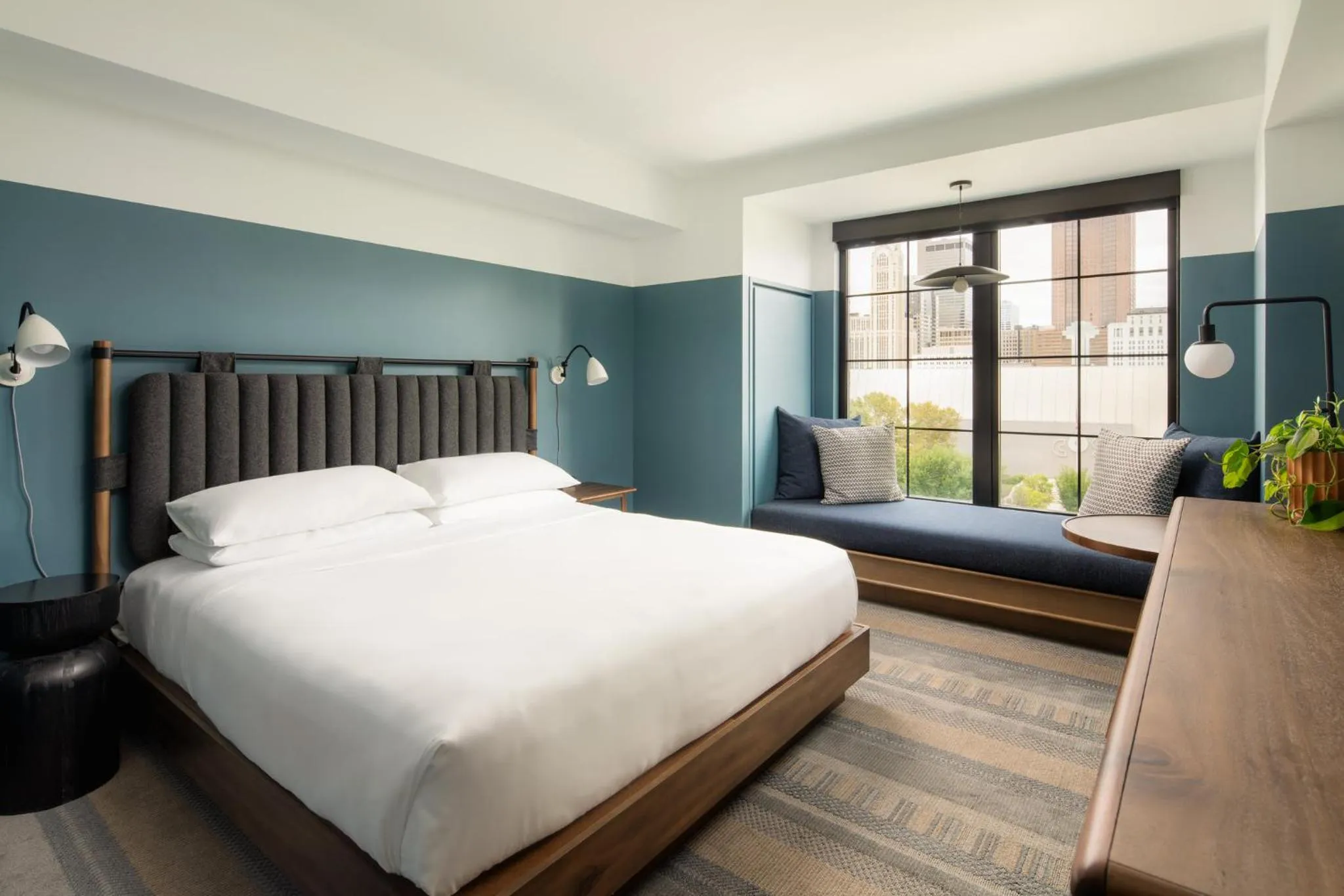 Bedroom in The Junto Hotel