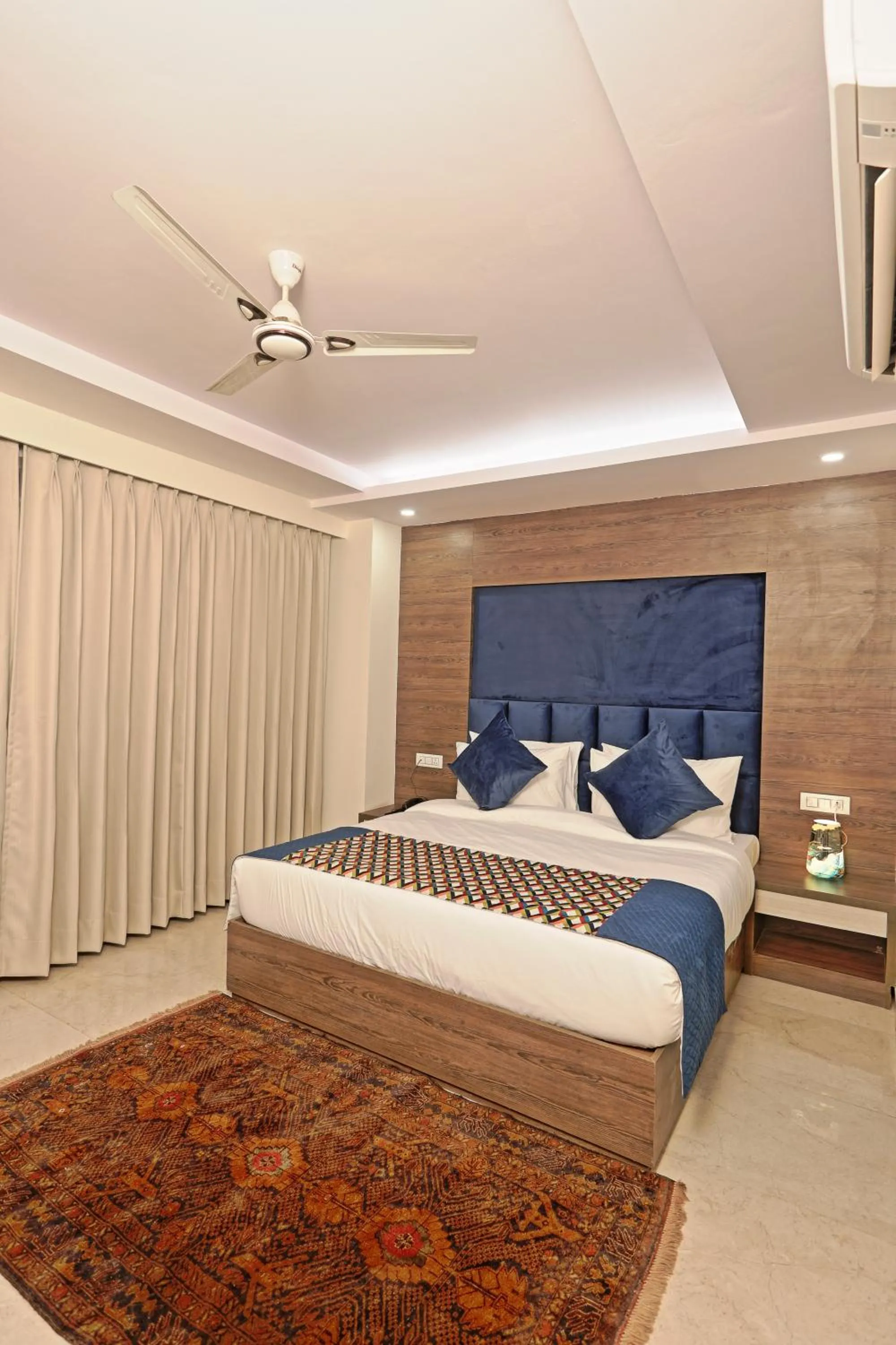 Bed in Hotel Cardinal Oxmo Delhi Airport