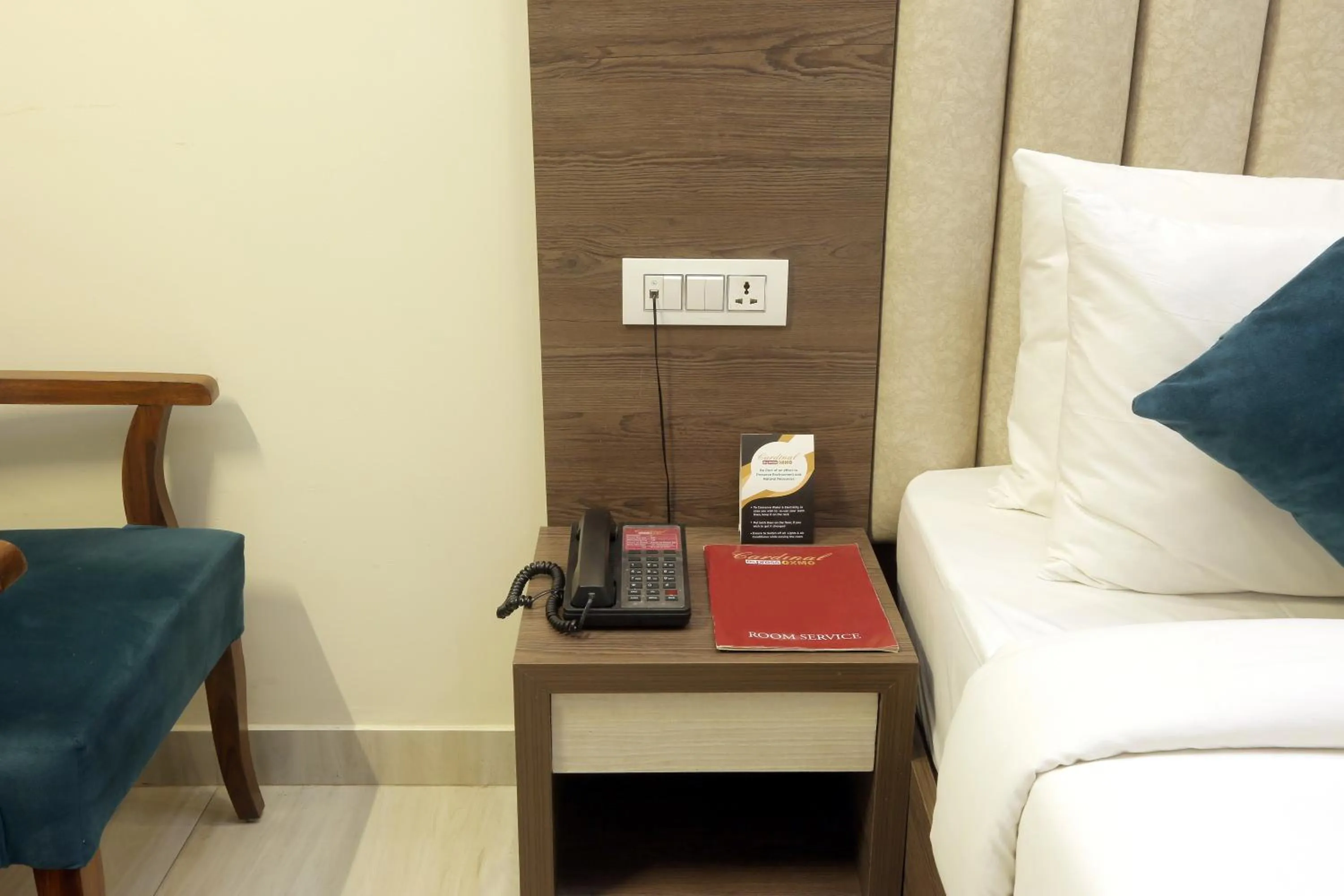 Bed in Hotel Cardinal Oxmo Delhi Airport