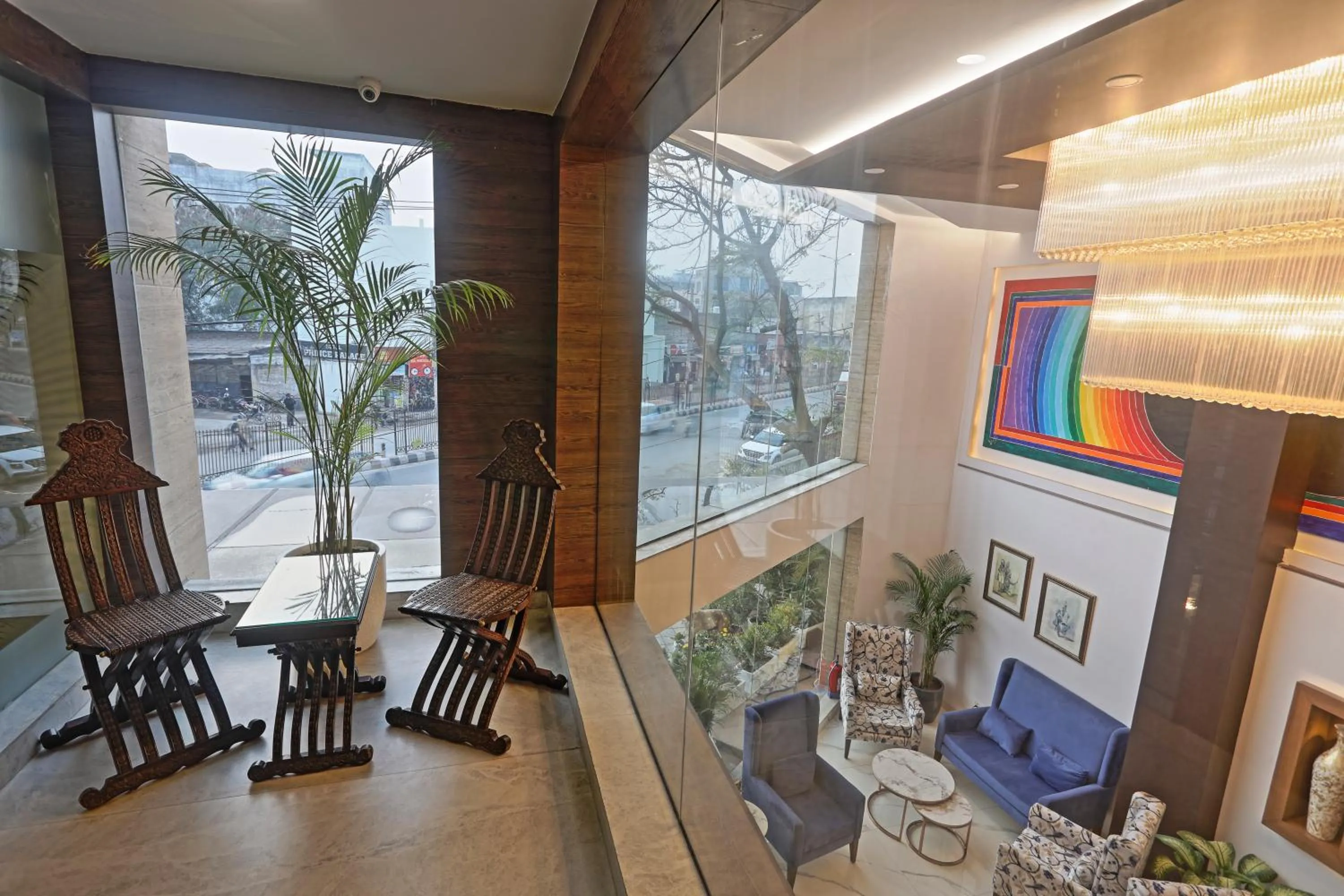 Seating area in Hotel Cardinal Oxmo Delhi Airport