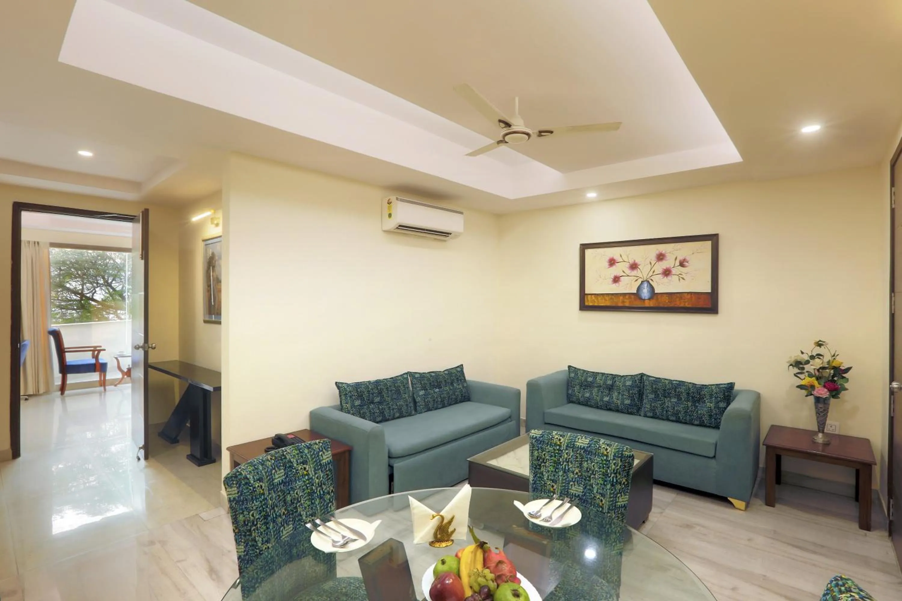 Seating area in Hotel Cardinal Oxmo Delhi Airport