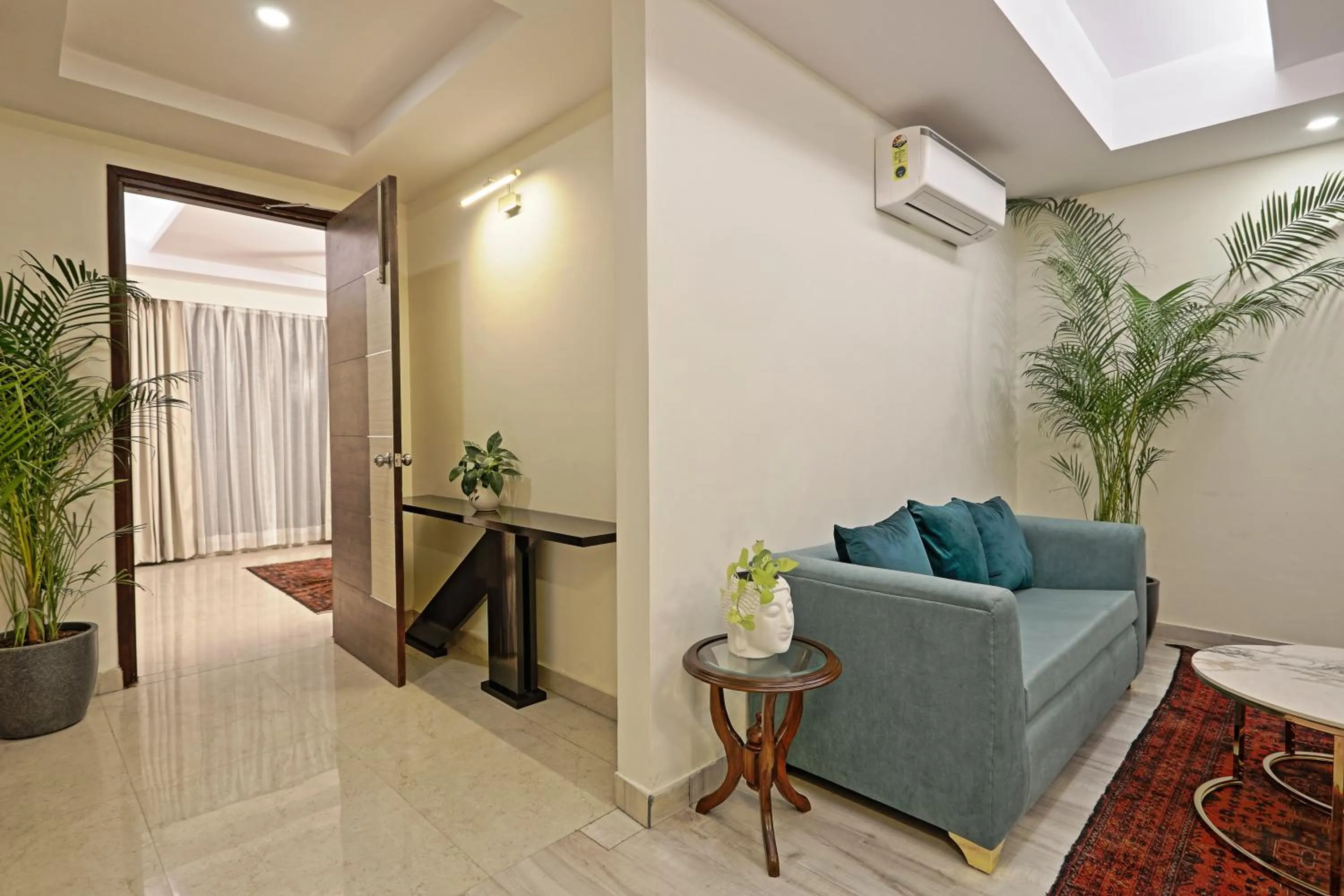 Seating area in Hotel Cardinal Oxmo Delhi Airport