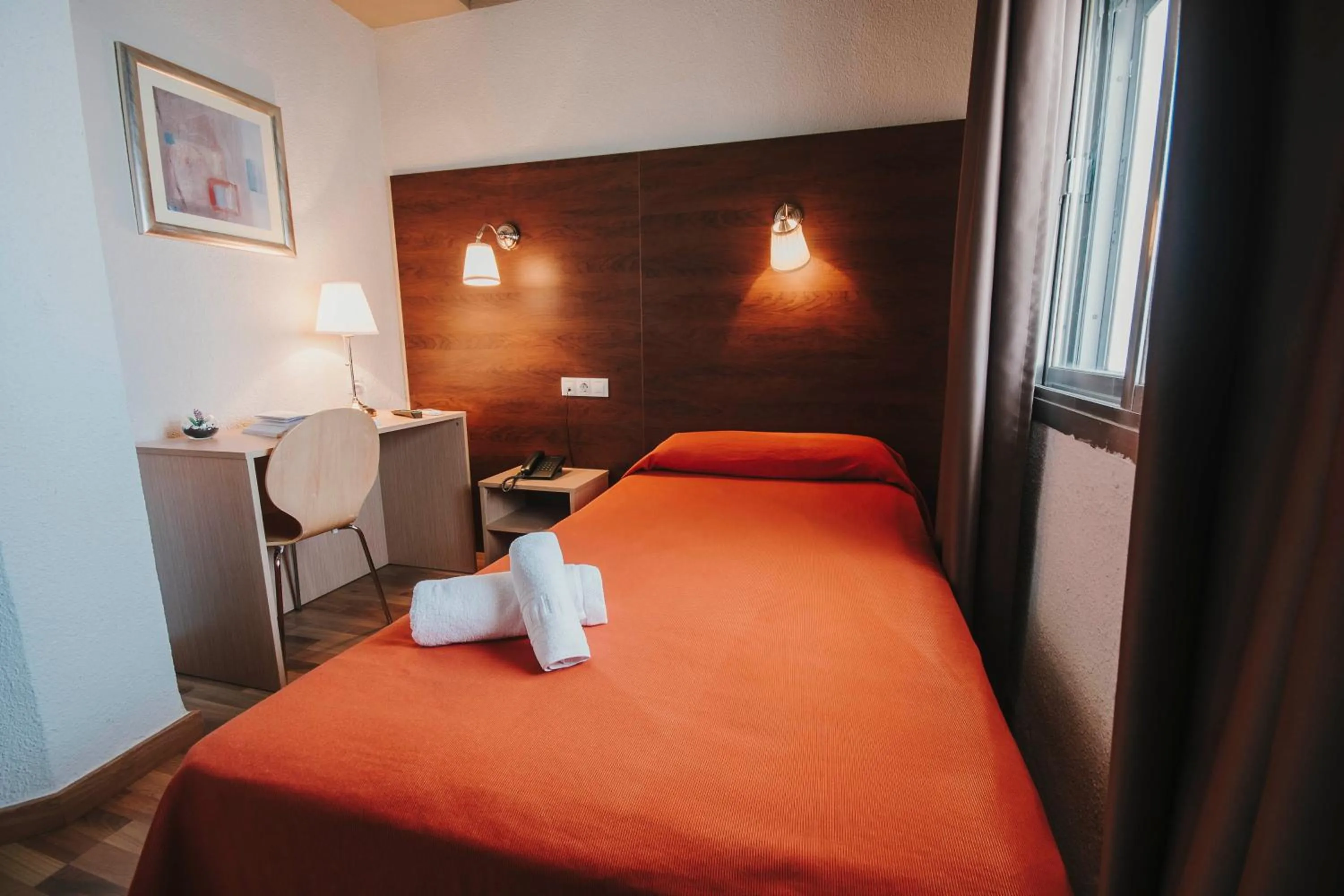 Bed in Hotel Embajador