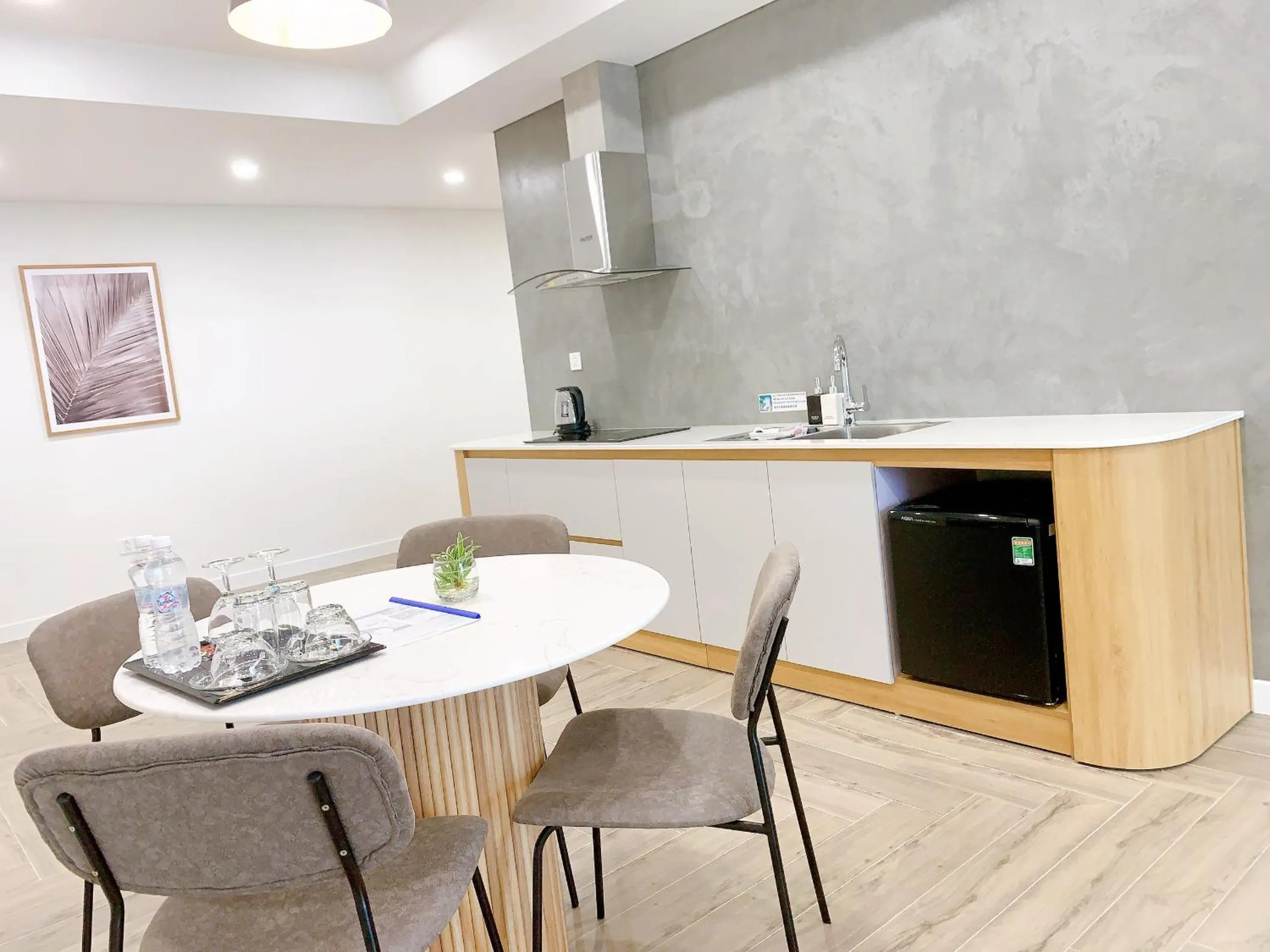Kitchen or kitchenette in TSQ STAY Hotel Apartment