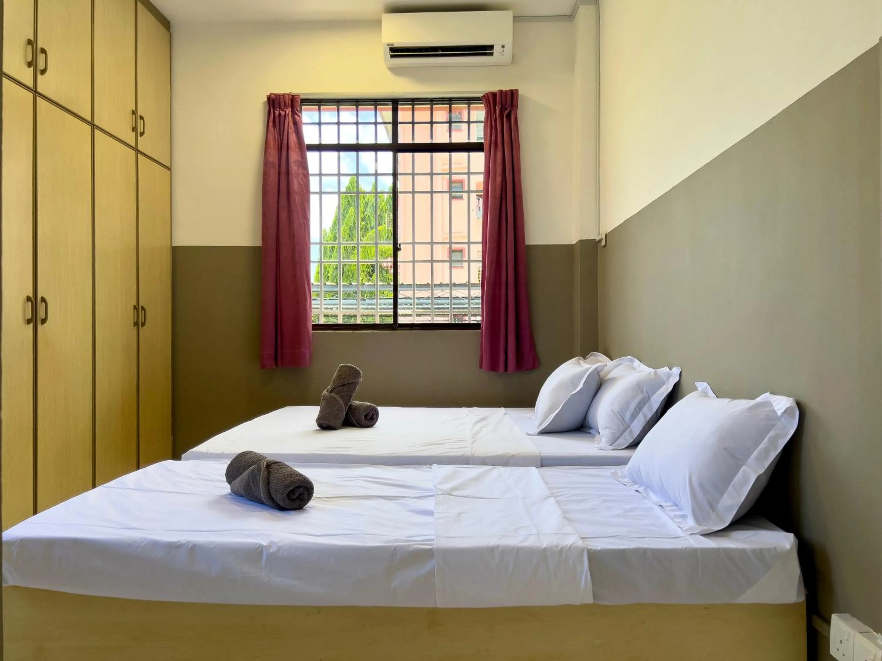 Bed in Hush Inn at Taman Penampang