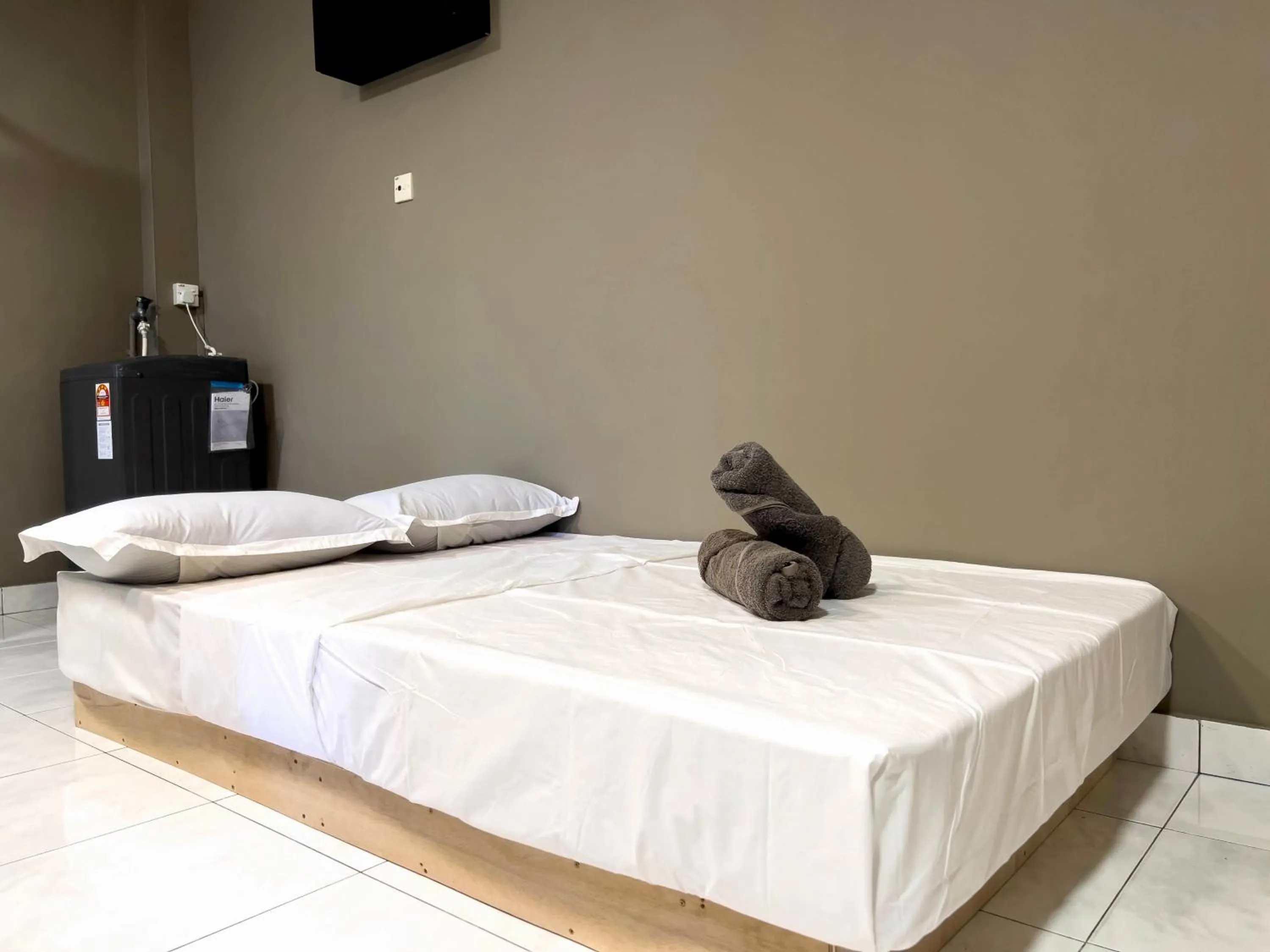 Bed in Hush Inn at Taman Penampang