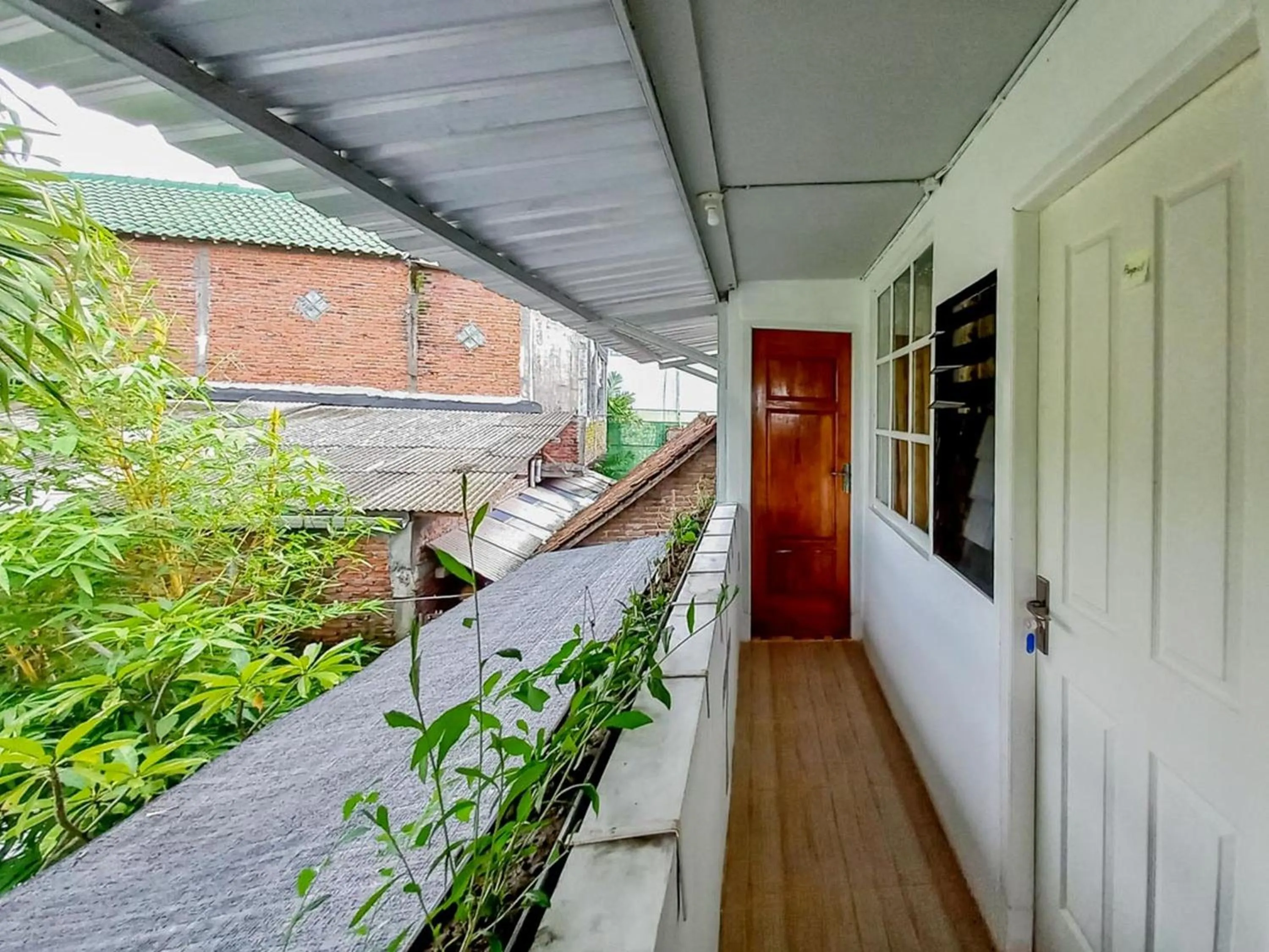 Balcony/Terrace in Labinda Homestay Caruban Mitra RedDoorz
