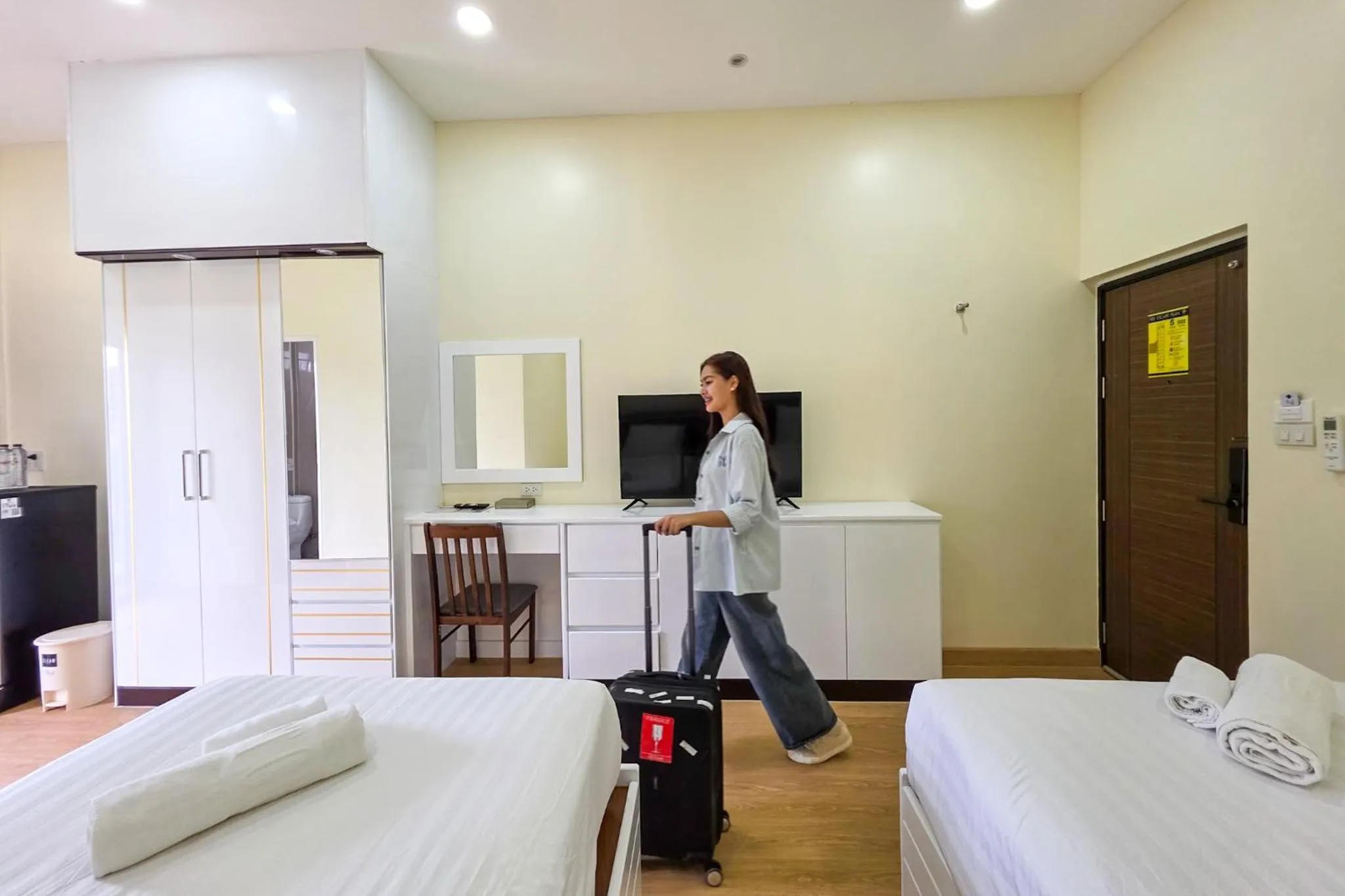 Bed in PT Grand Hotel