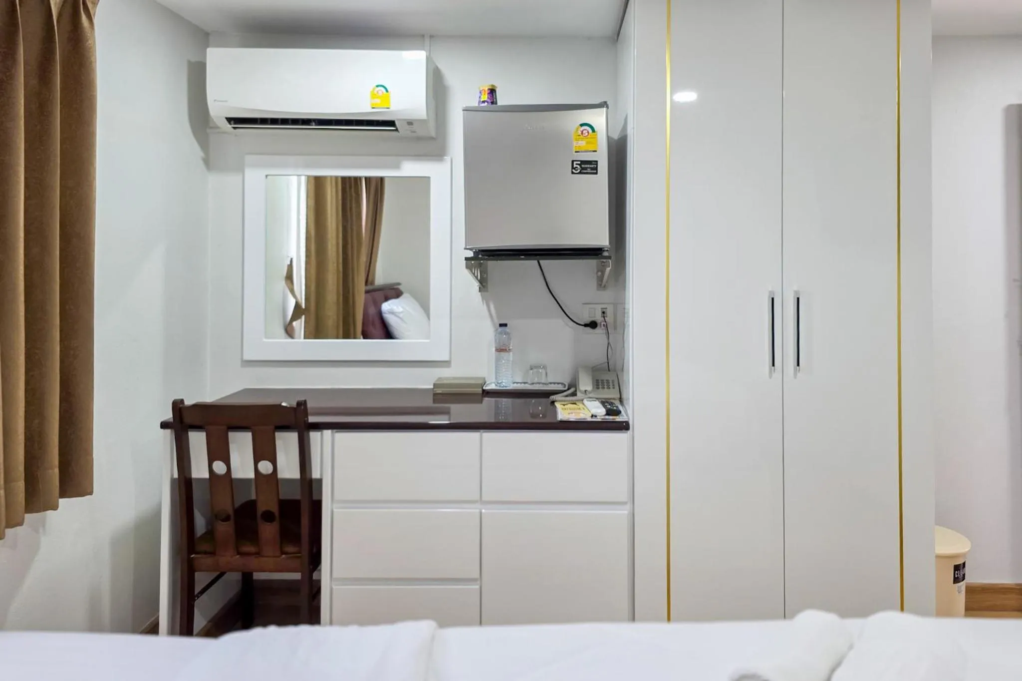 Bed in PT Grand Hotel