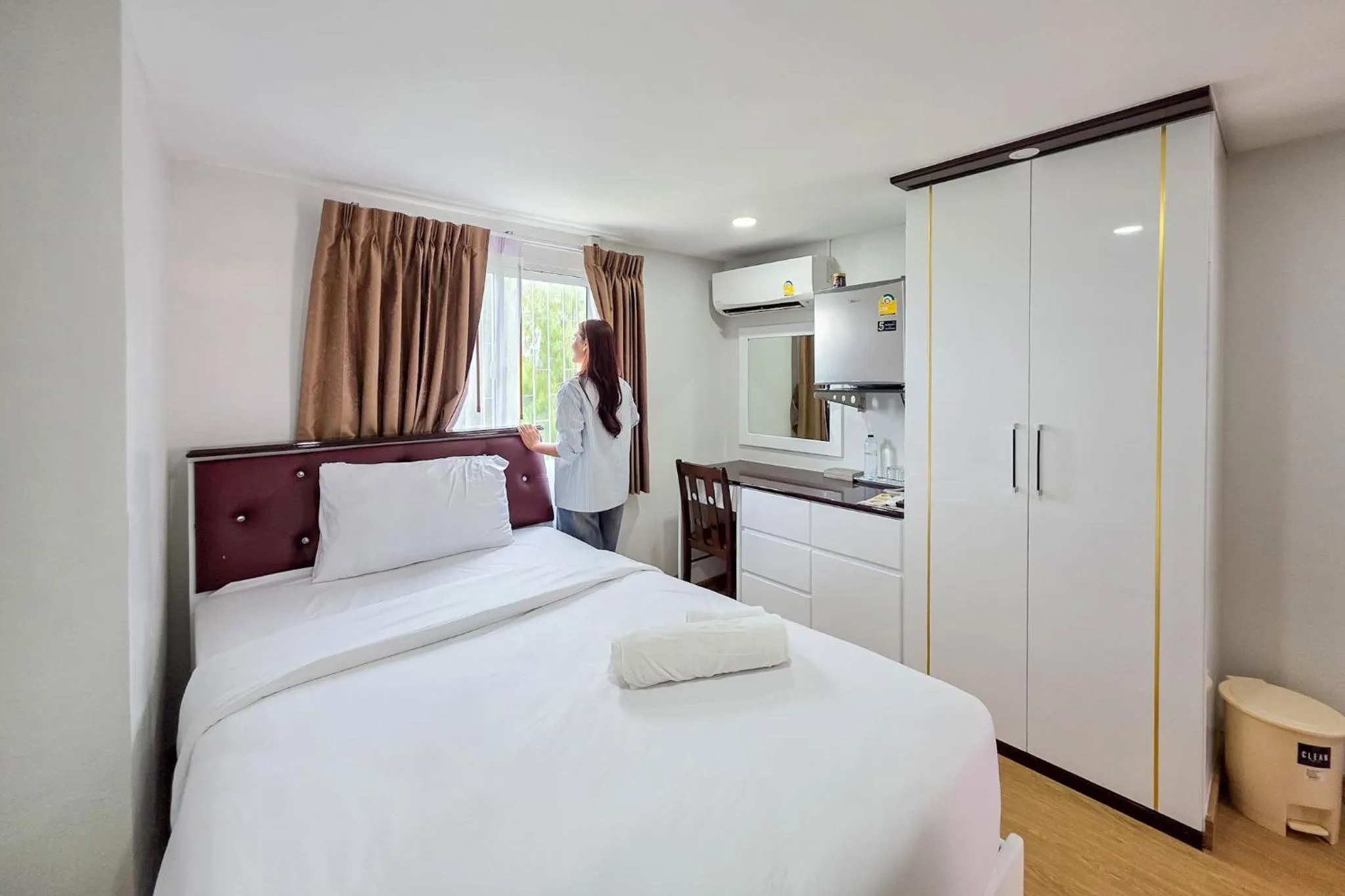 Bed in PT Grand Hotel