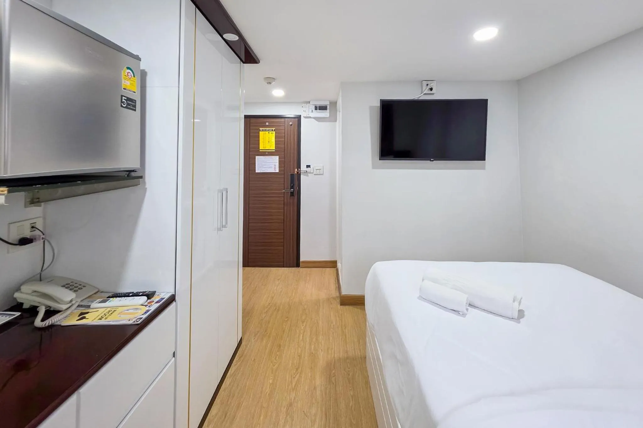 Bed in PT Grand Hotel