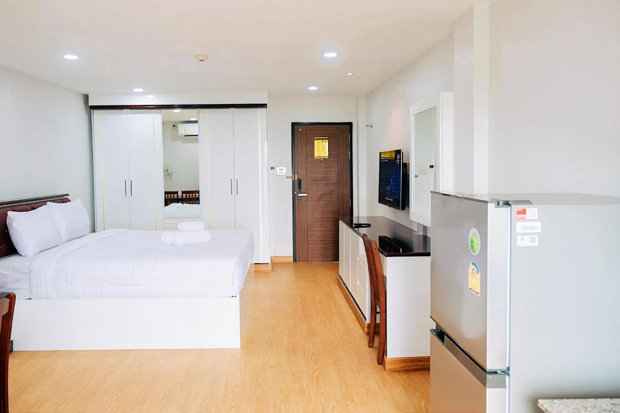 Bed in PT Grand Hotel