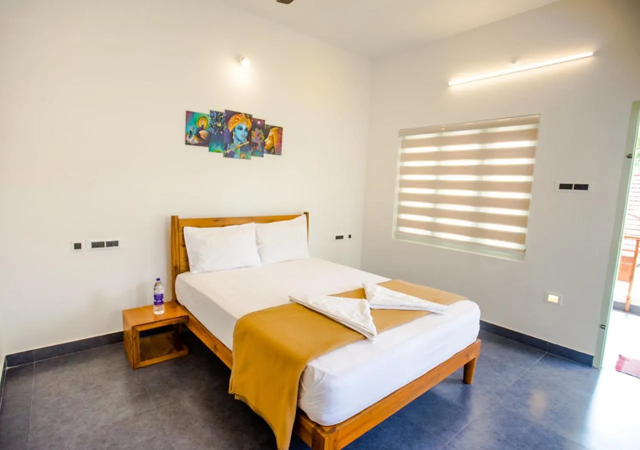 Bed in Ocean View Beach Villa Varkala by VOYE HOMES