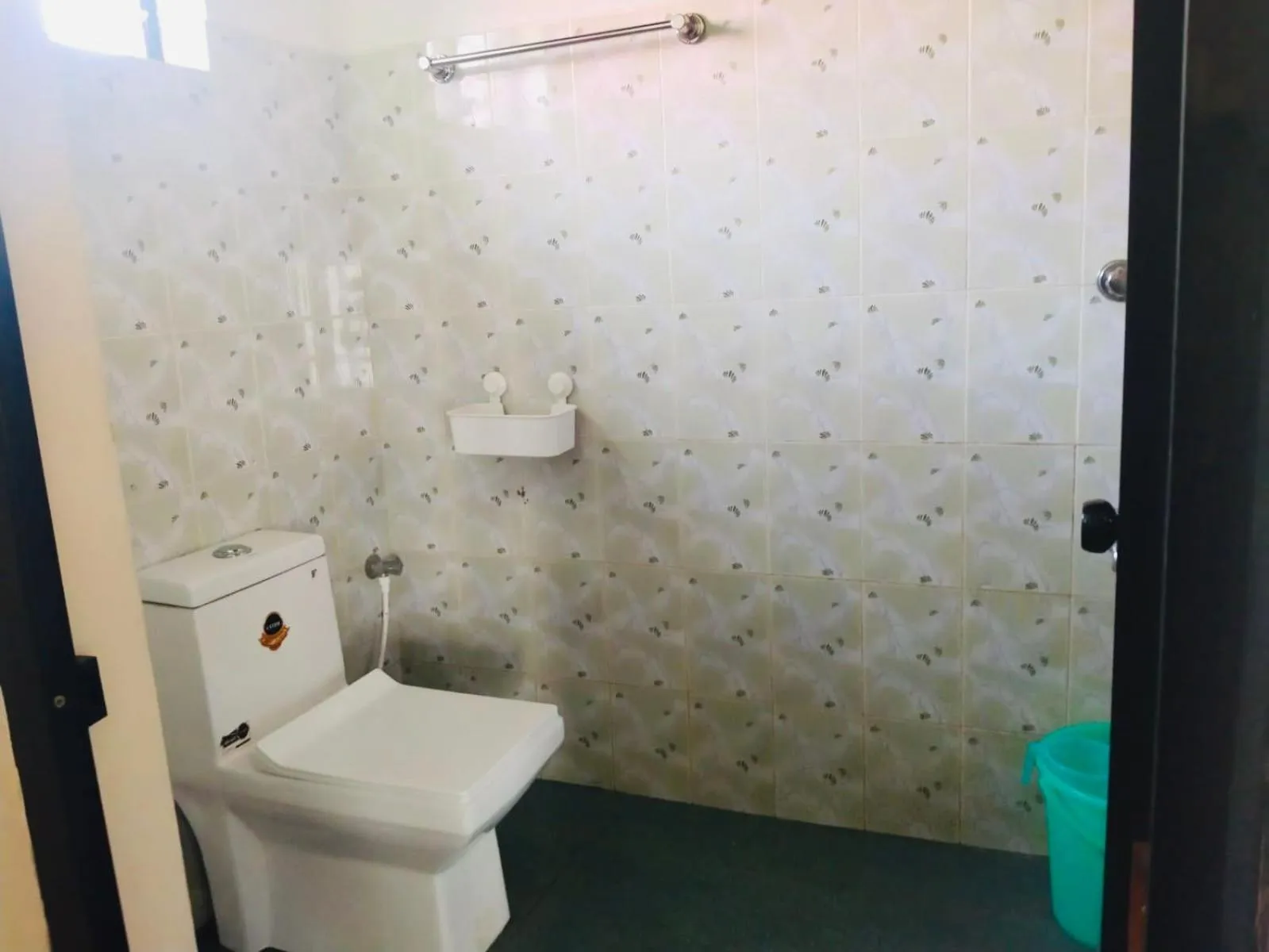 Toilet in Ocean View Beach Villa Varkala by VOYE HOMES
