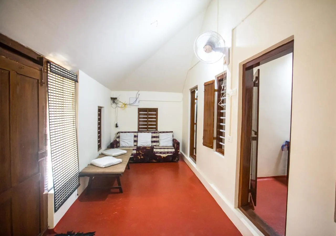 Living room, Bed in Ocean View Beach Villa Varkala by VOYE HOMES