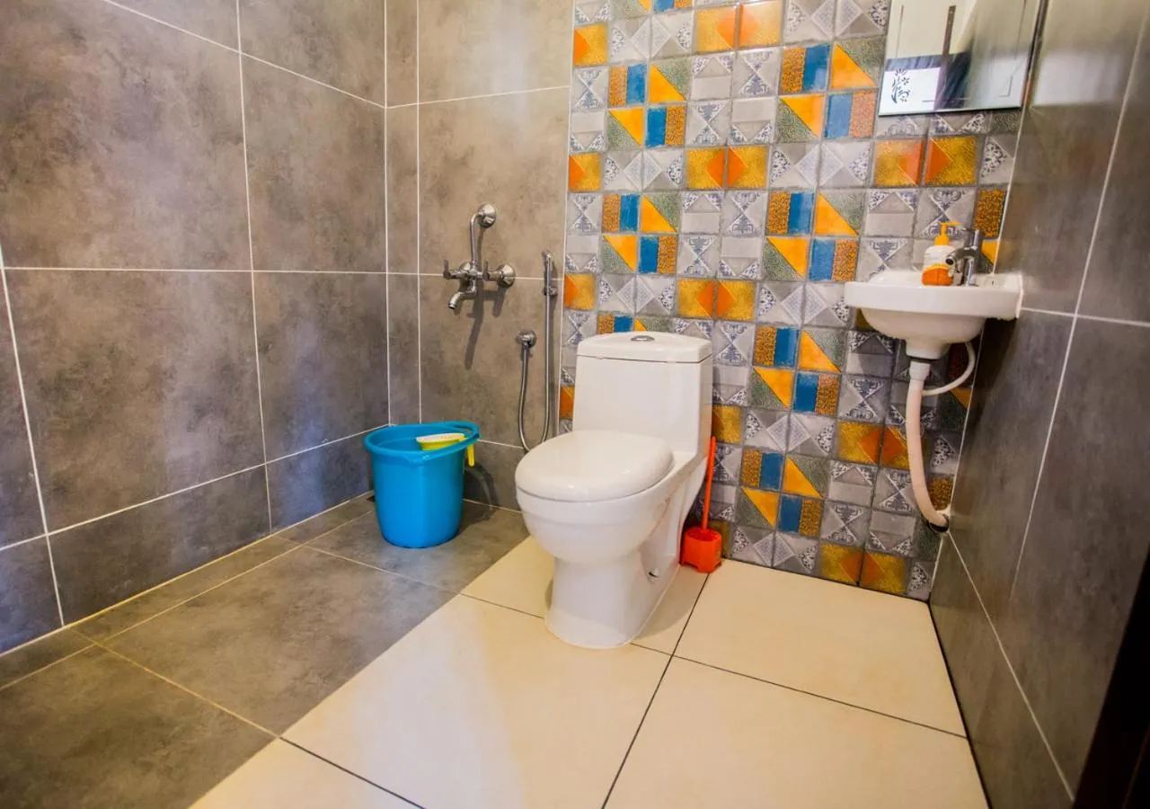 Shower in Ocean View Beach Villa Varkala by VOYE HOMES