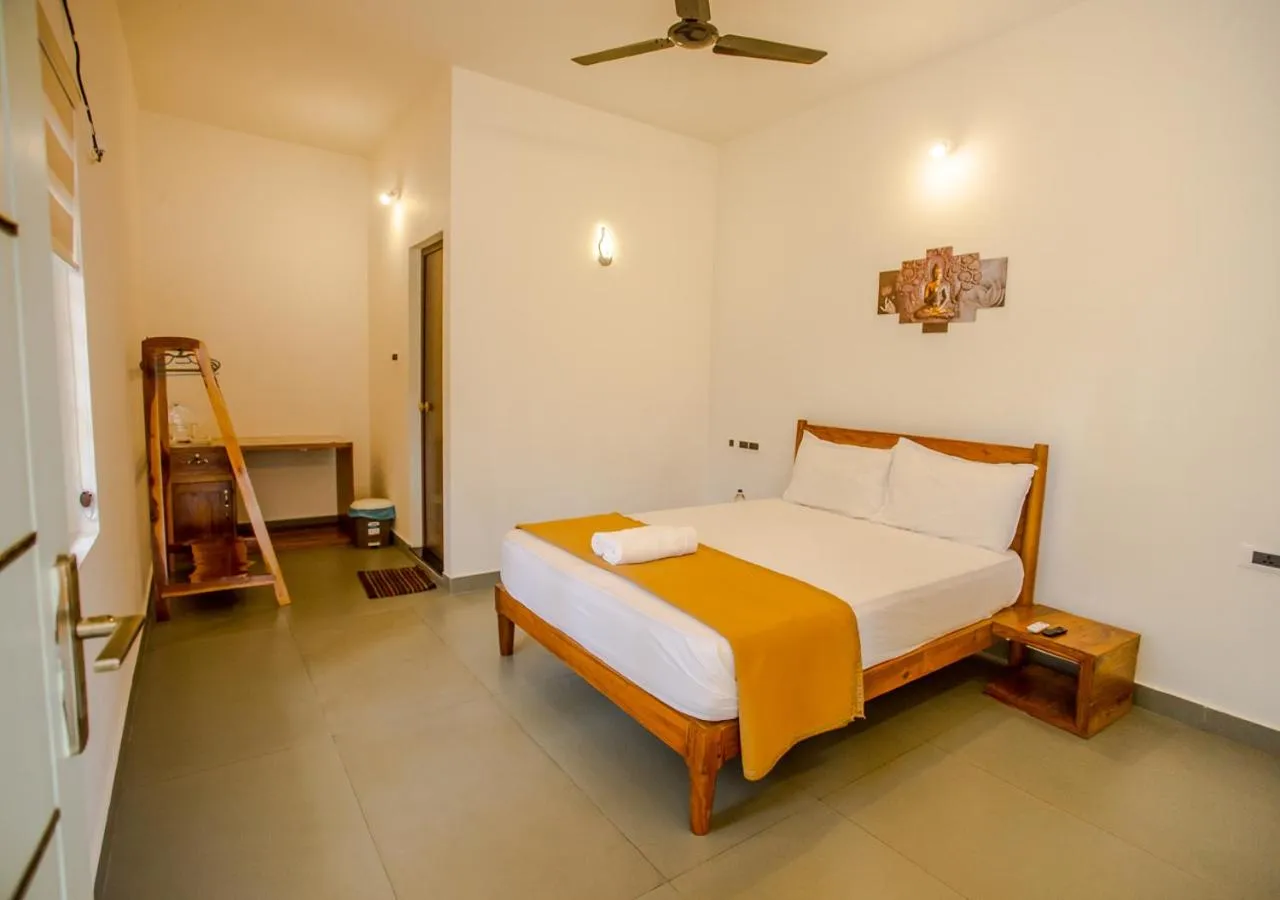 Bed in Ocean View Beach Villa Varkala by VOYE HOMES