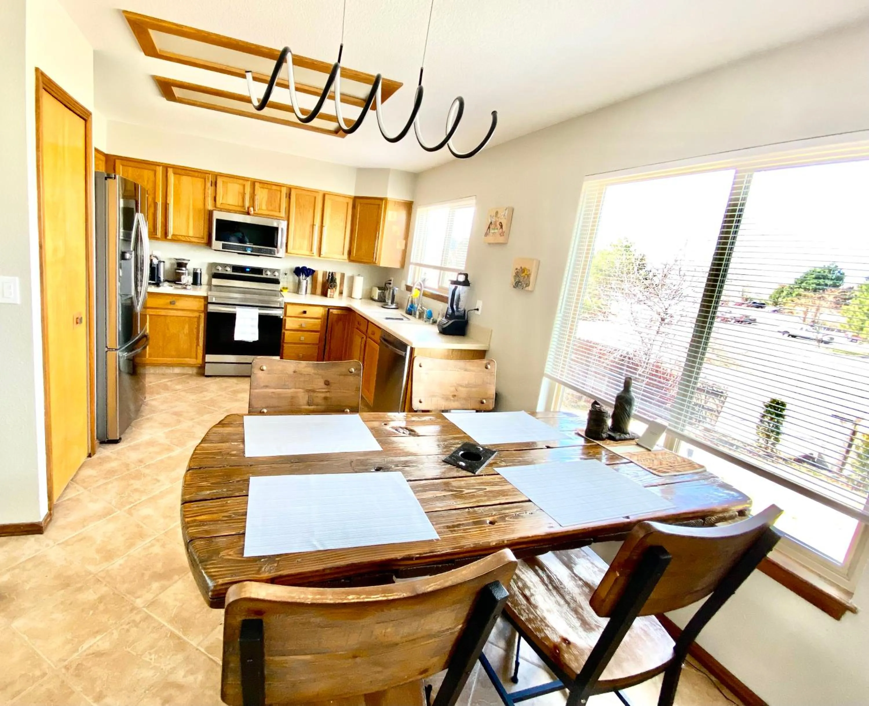 Dining area in 3br home 2br unit close to USAFA with fireplace