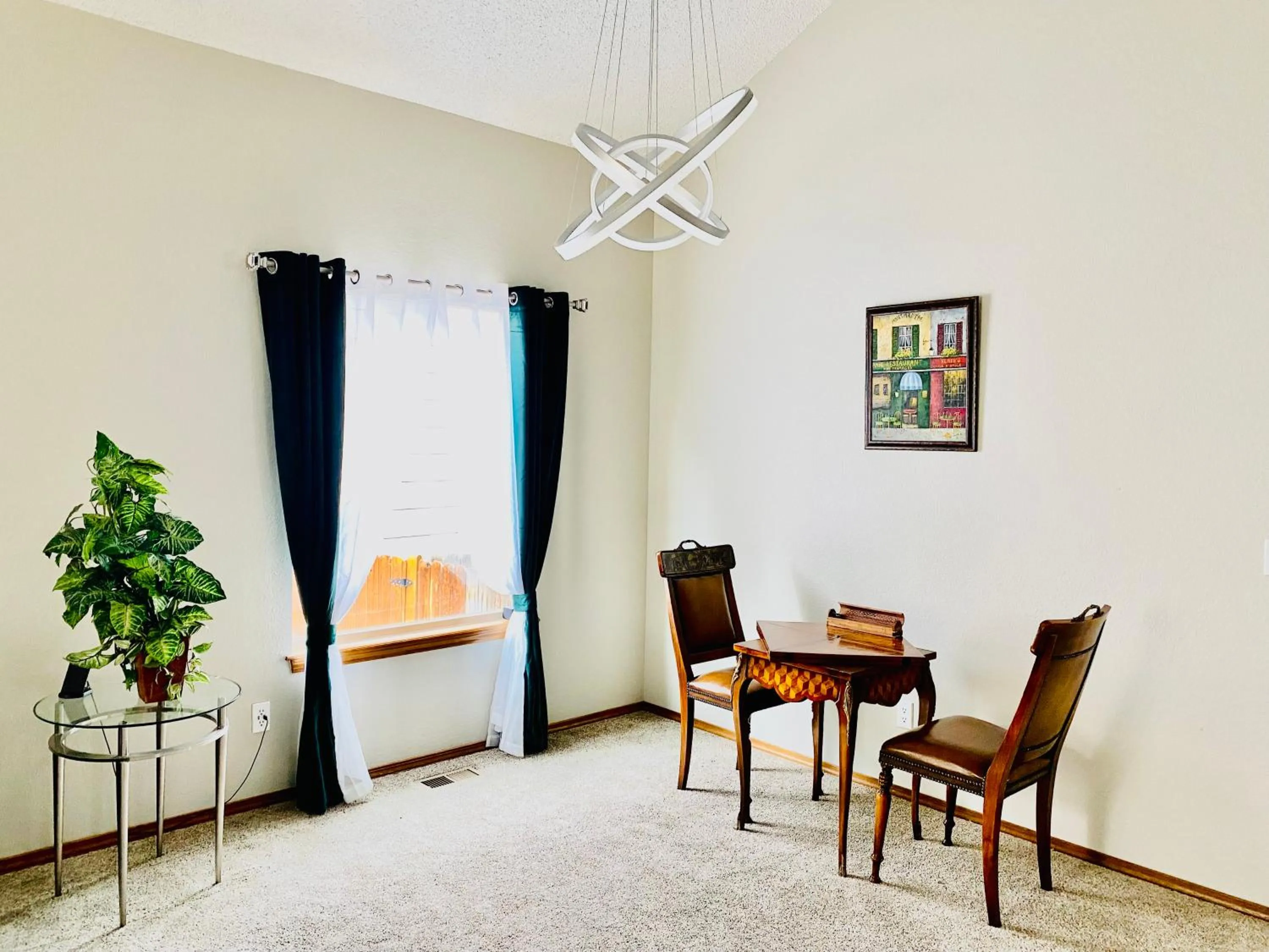 Living room in 3br home 2br unit close to USAFA with fireplace