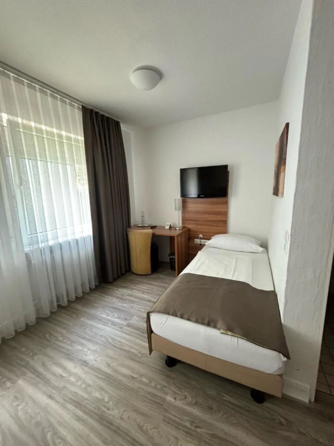 Bed in Hotel Schlangenbader Hof