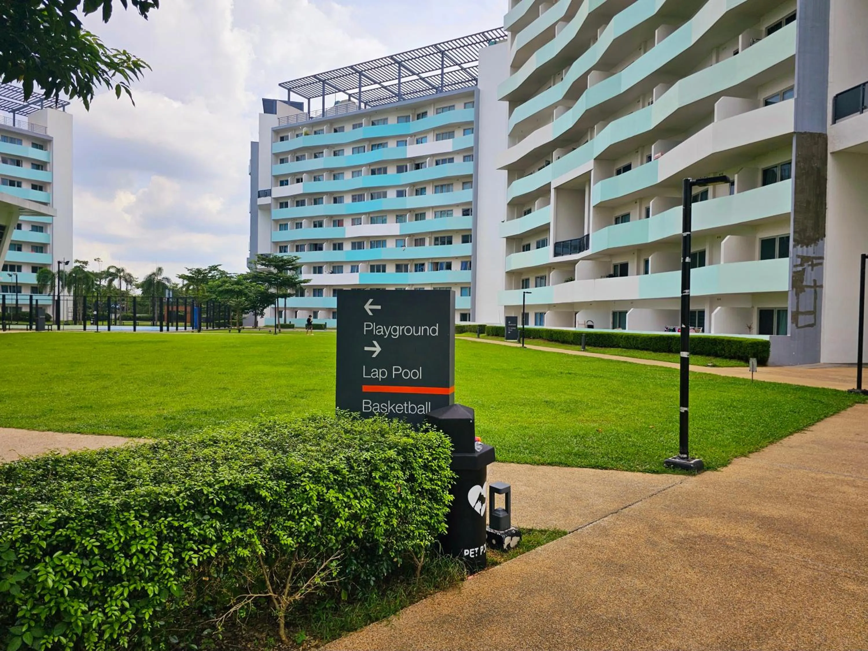 Property building in Acellyne's Suites at The Residences at Commonwealth by Century