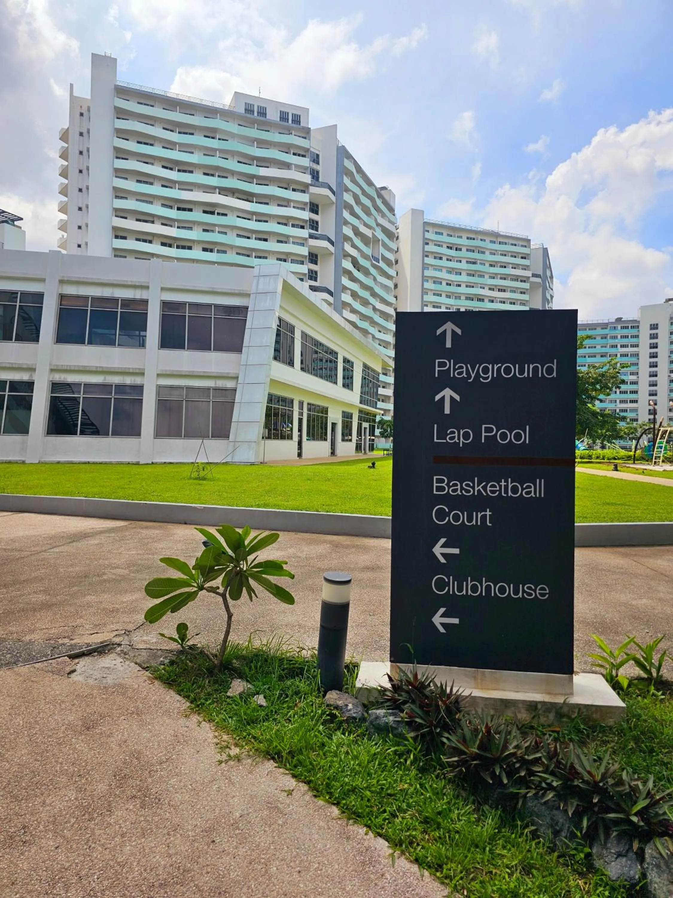 Property building in Acellyne's Suites at The Residences at Commonwealth by Century