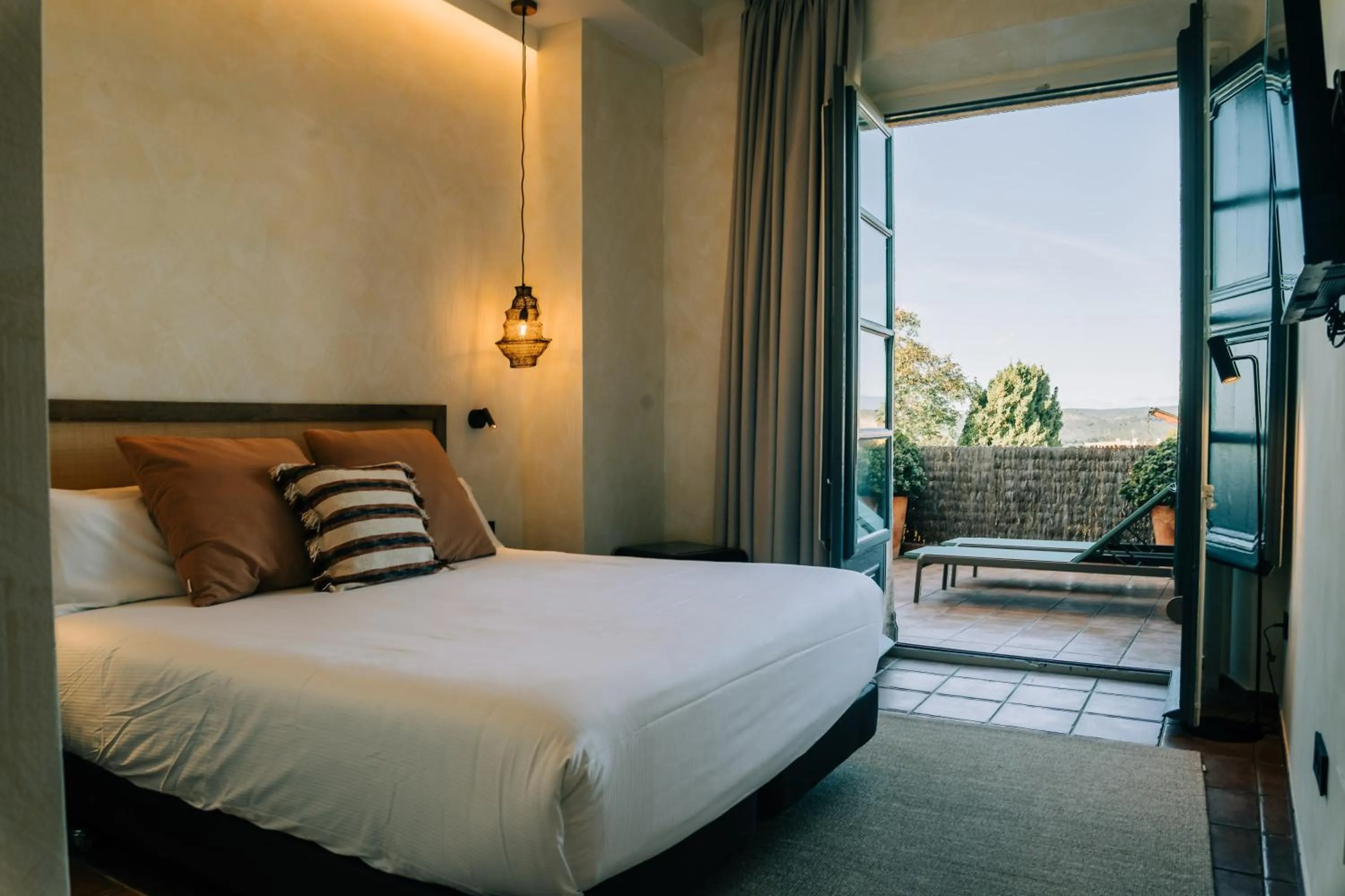 Bed in Gran Claustre Boutique Hotel
