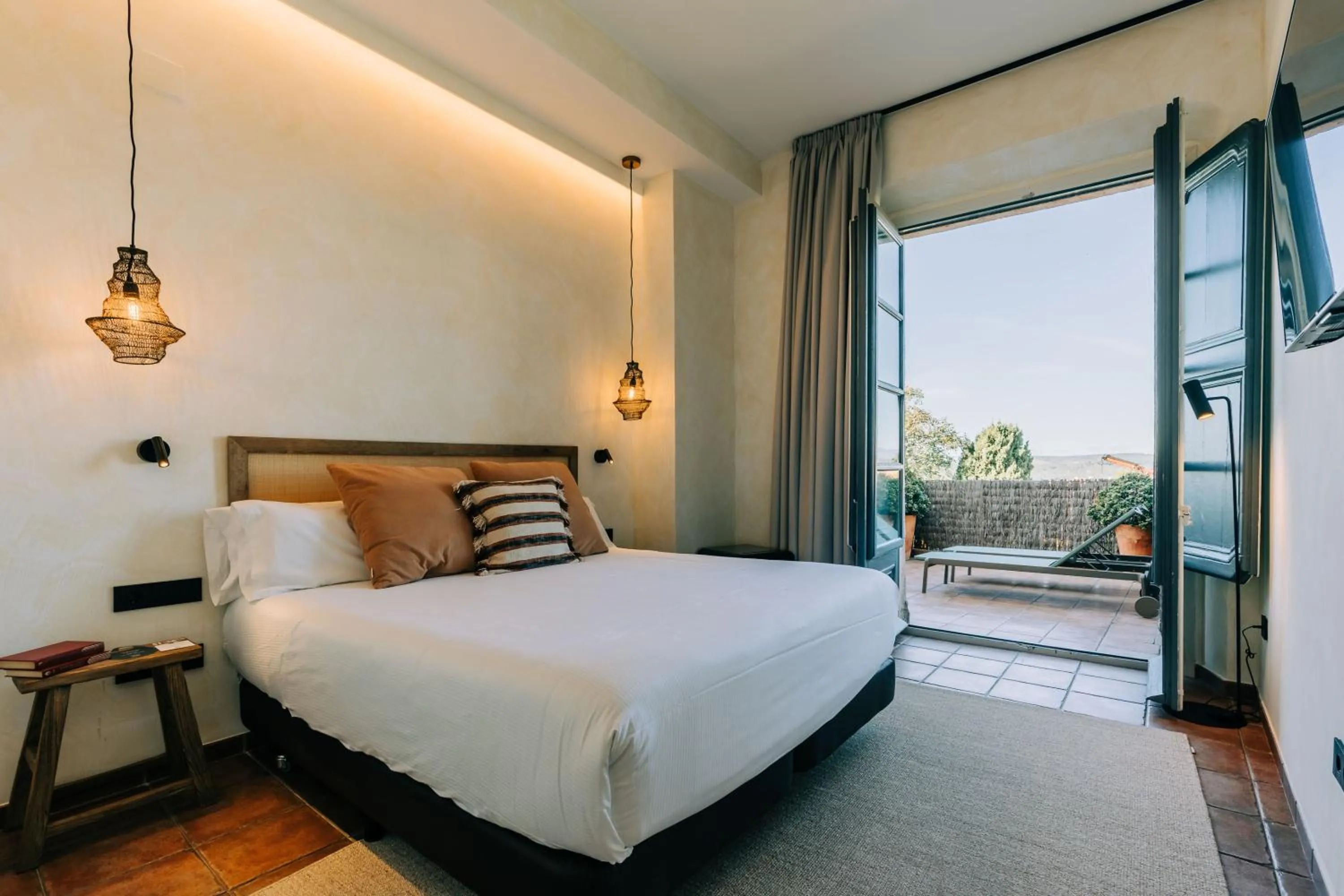 Bed in Gran Claustre Boutique Hotel