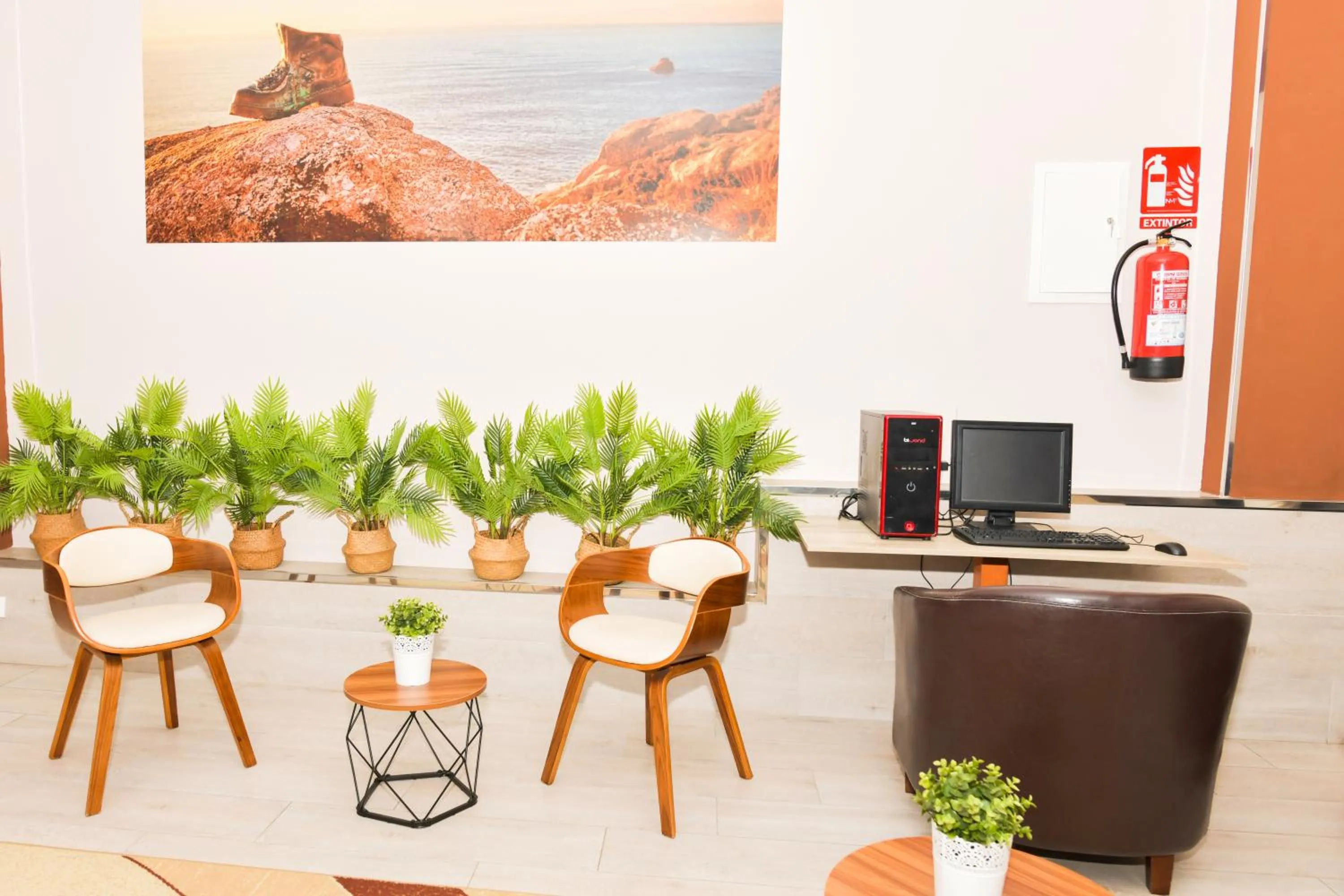 Communal lounge/ TV room in Hotel Ancora