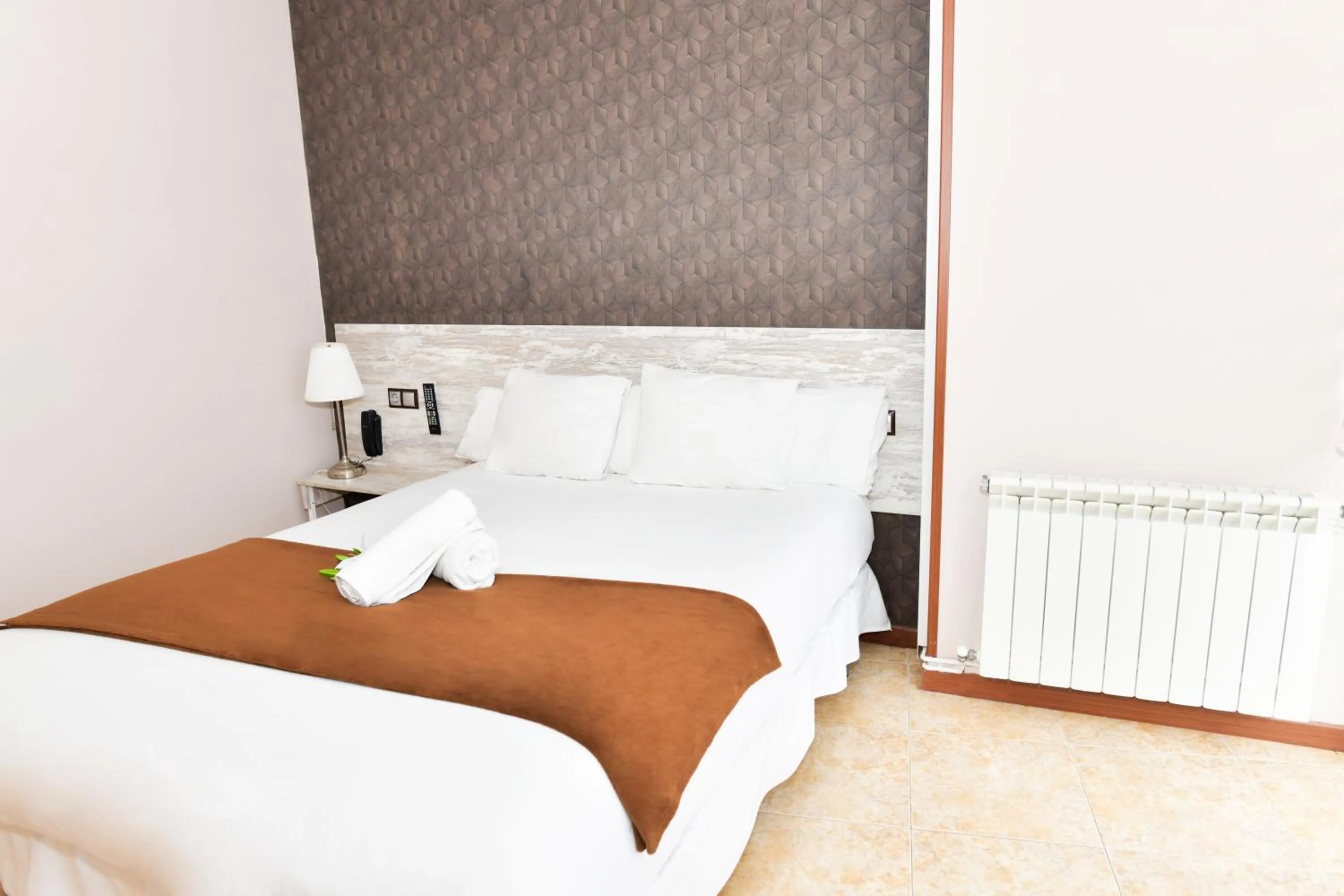 Bed in Hotel Ancora