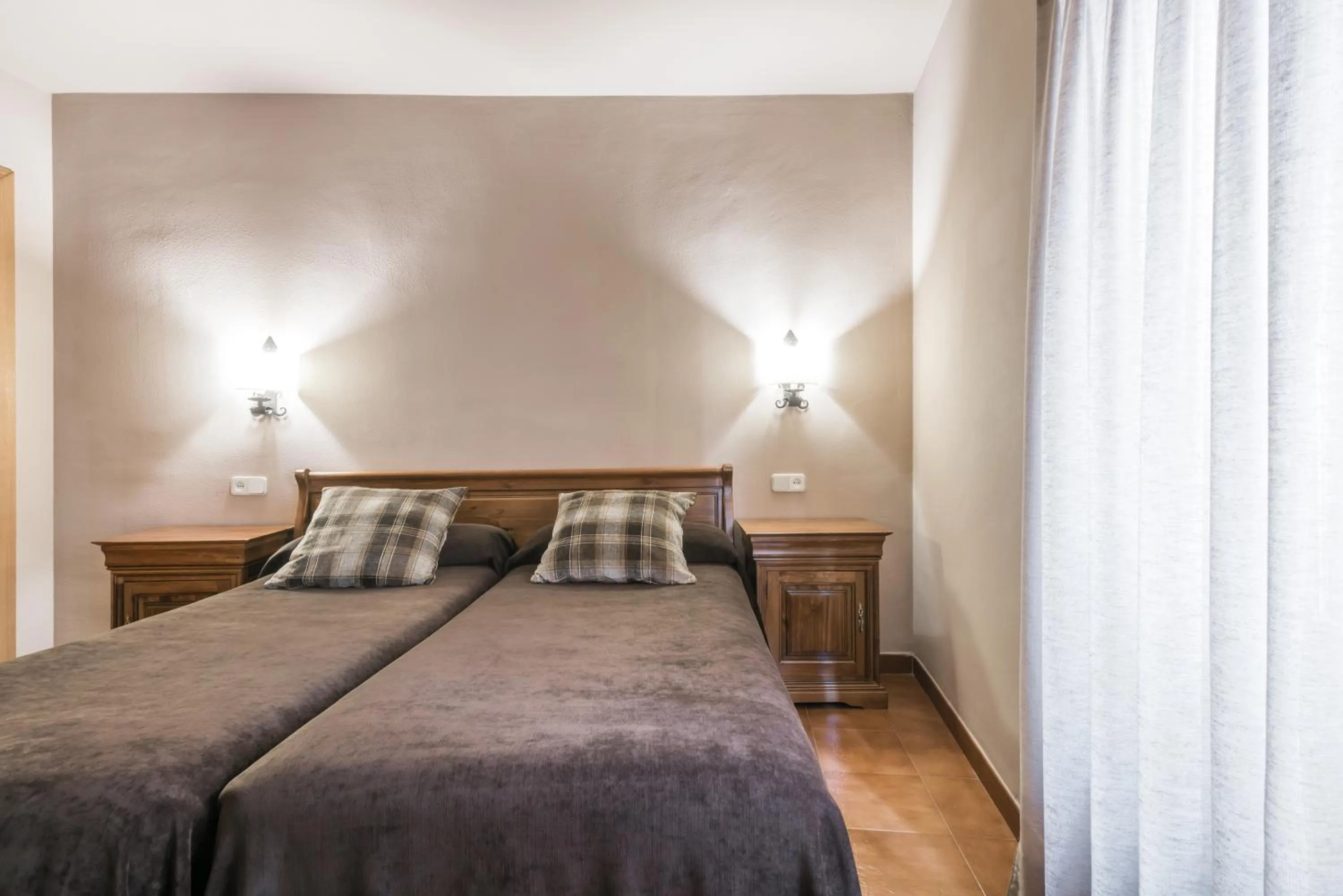 Bed in Riu Nere Mountain Apartments