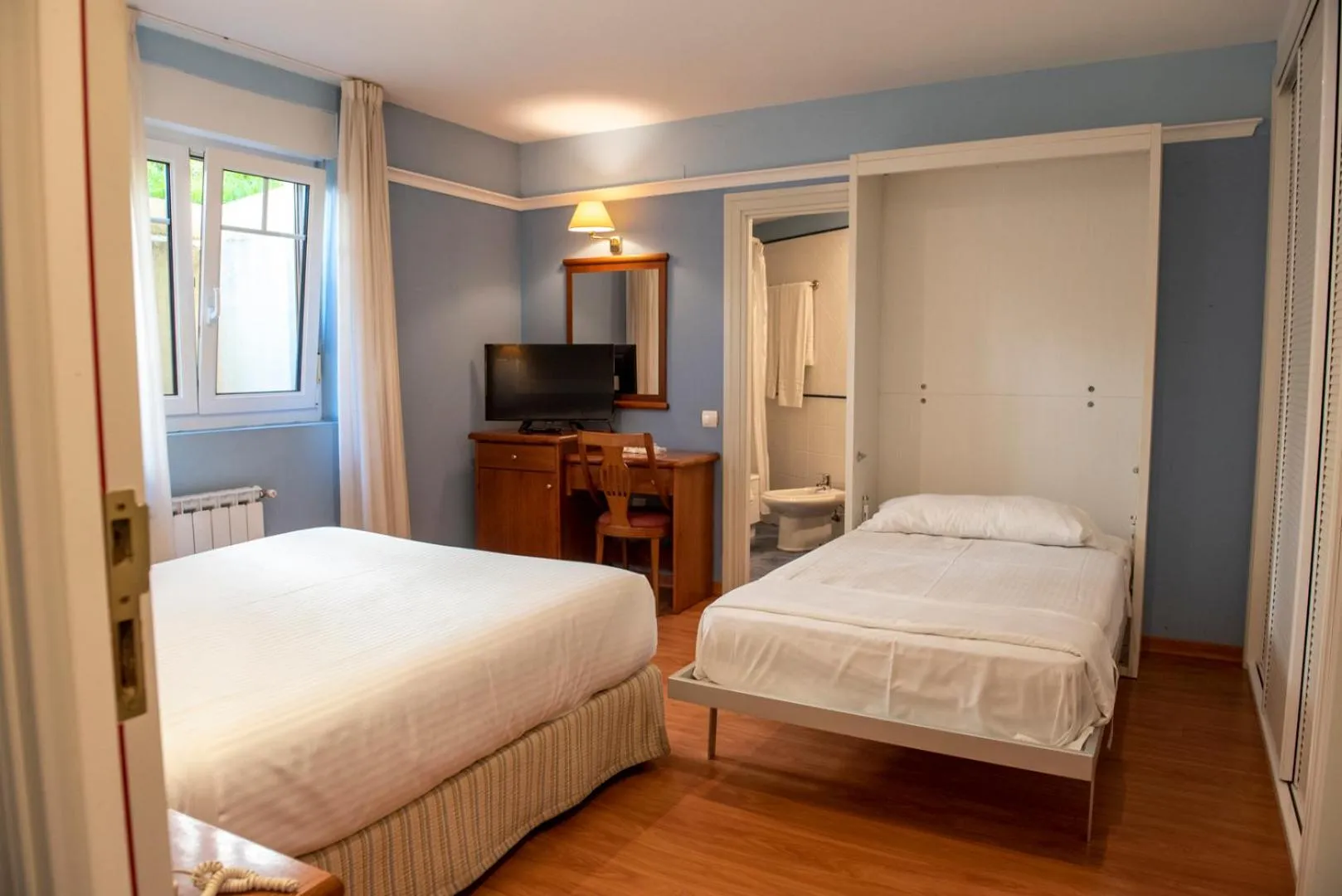 Photo of the whole room, Bed in Hotel Faro de San Vicente