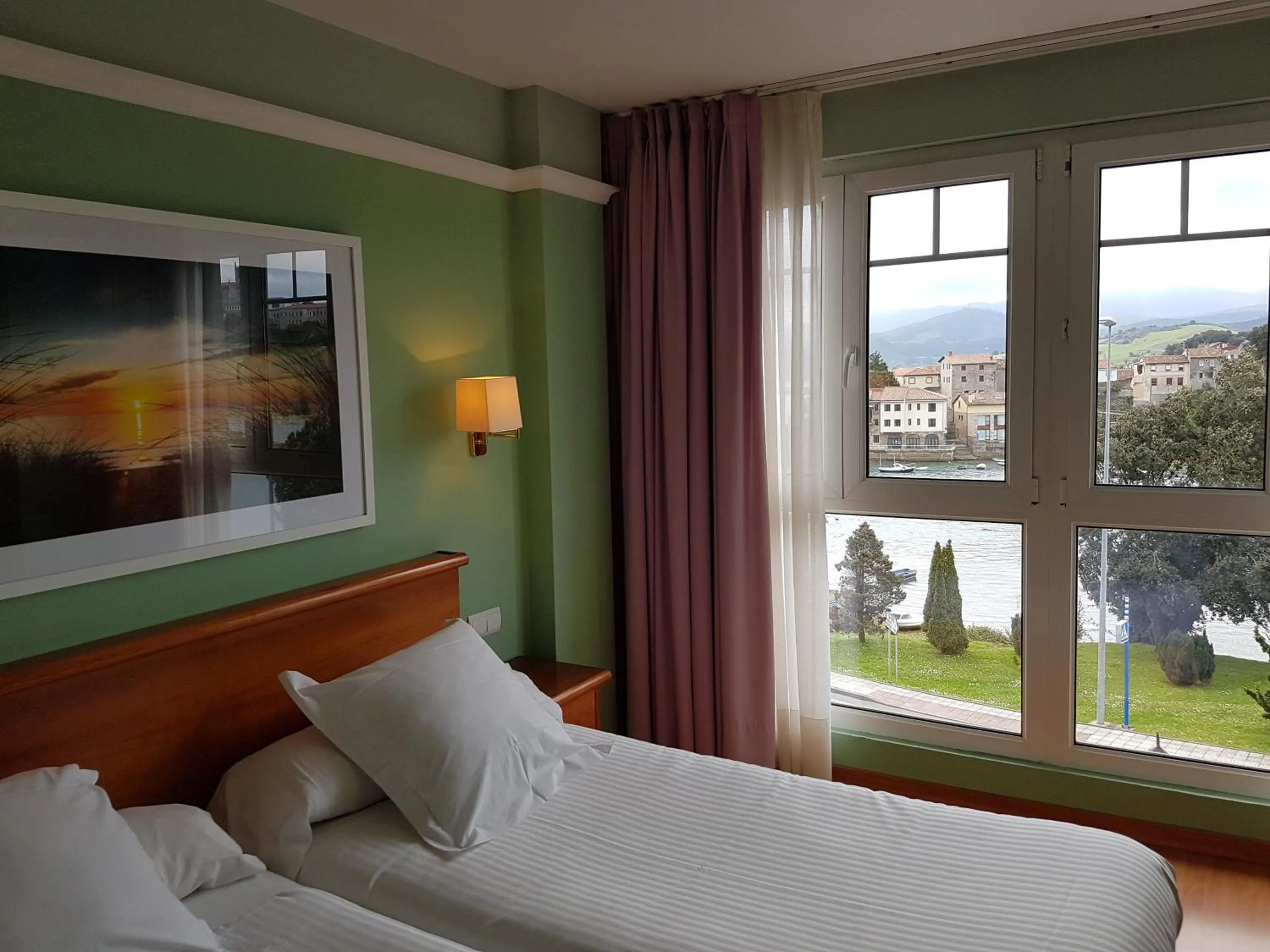 Photo of the whole room, Bed in Hotel Faro de San Vicente