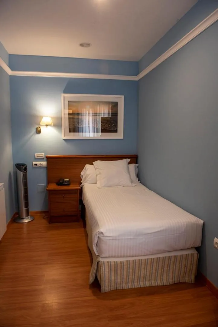 Bed in Hotel Faro de San Vicente