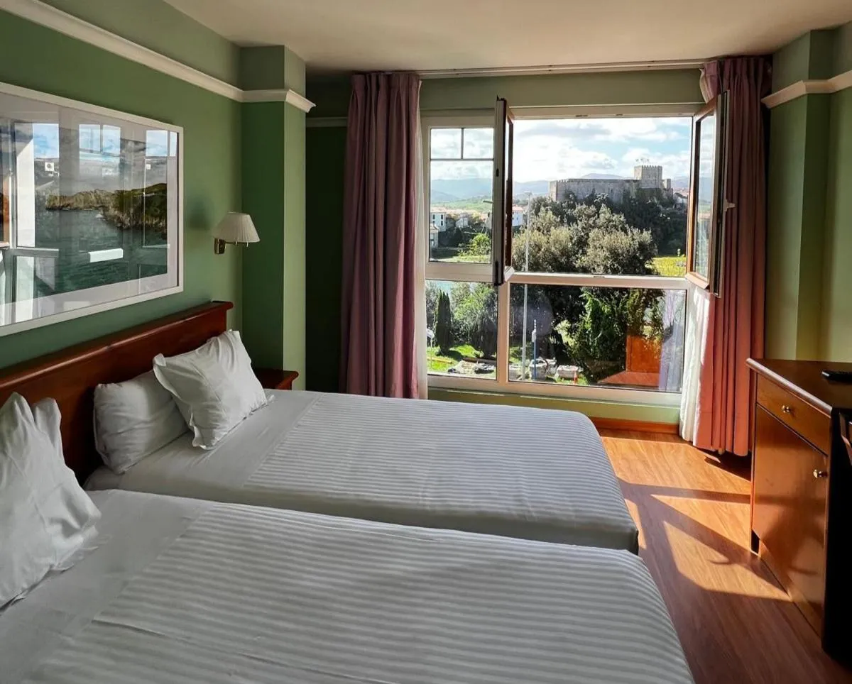 Bed in Hotel Faro de San Vicente