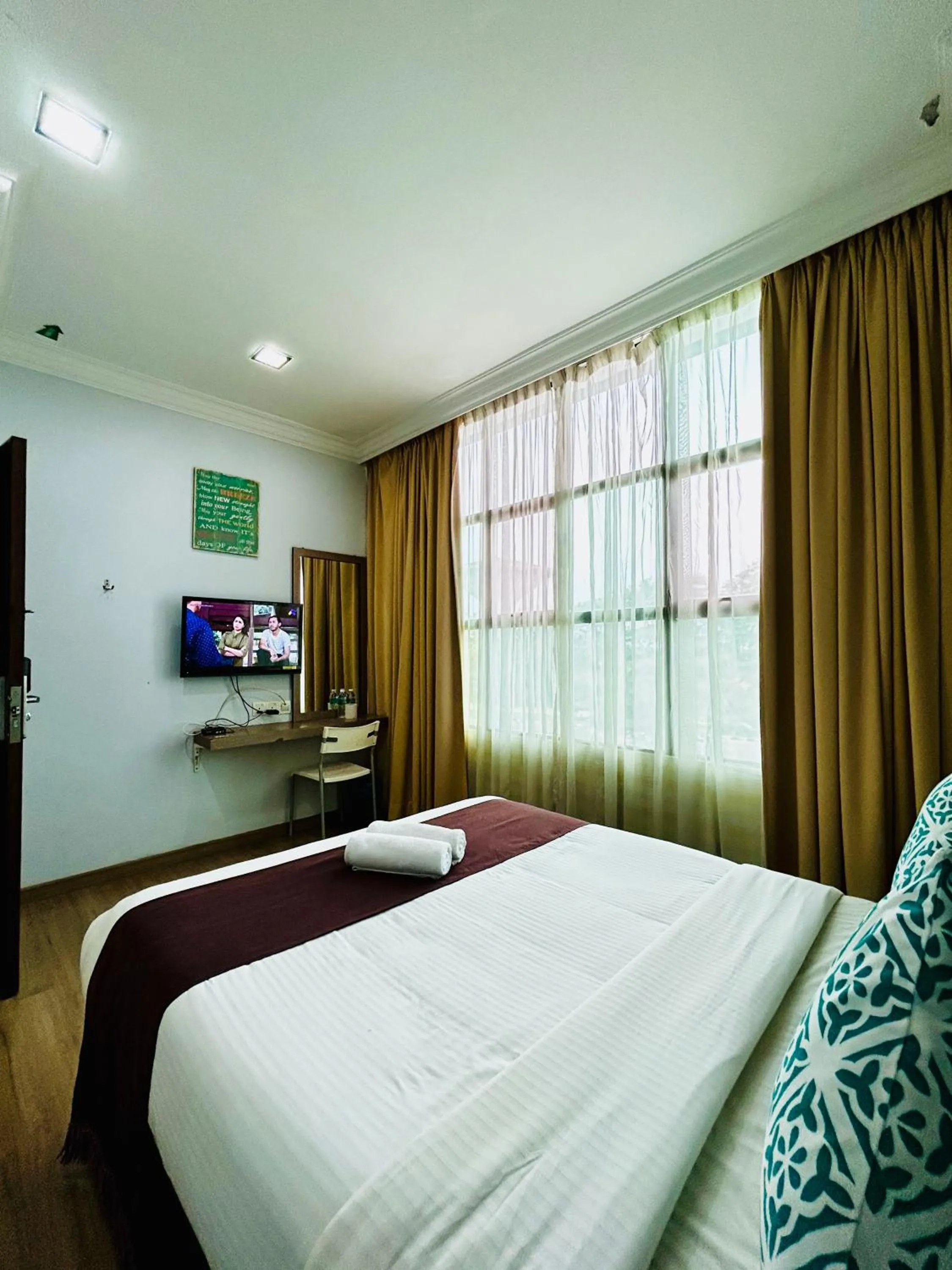 Bed in CHARISMA HOTEL