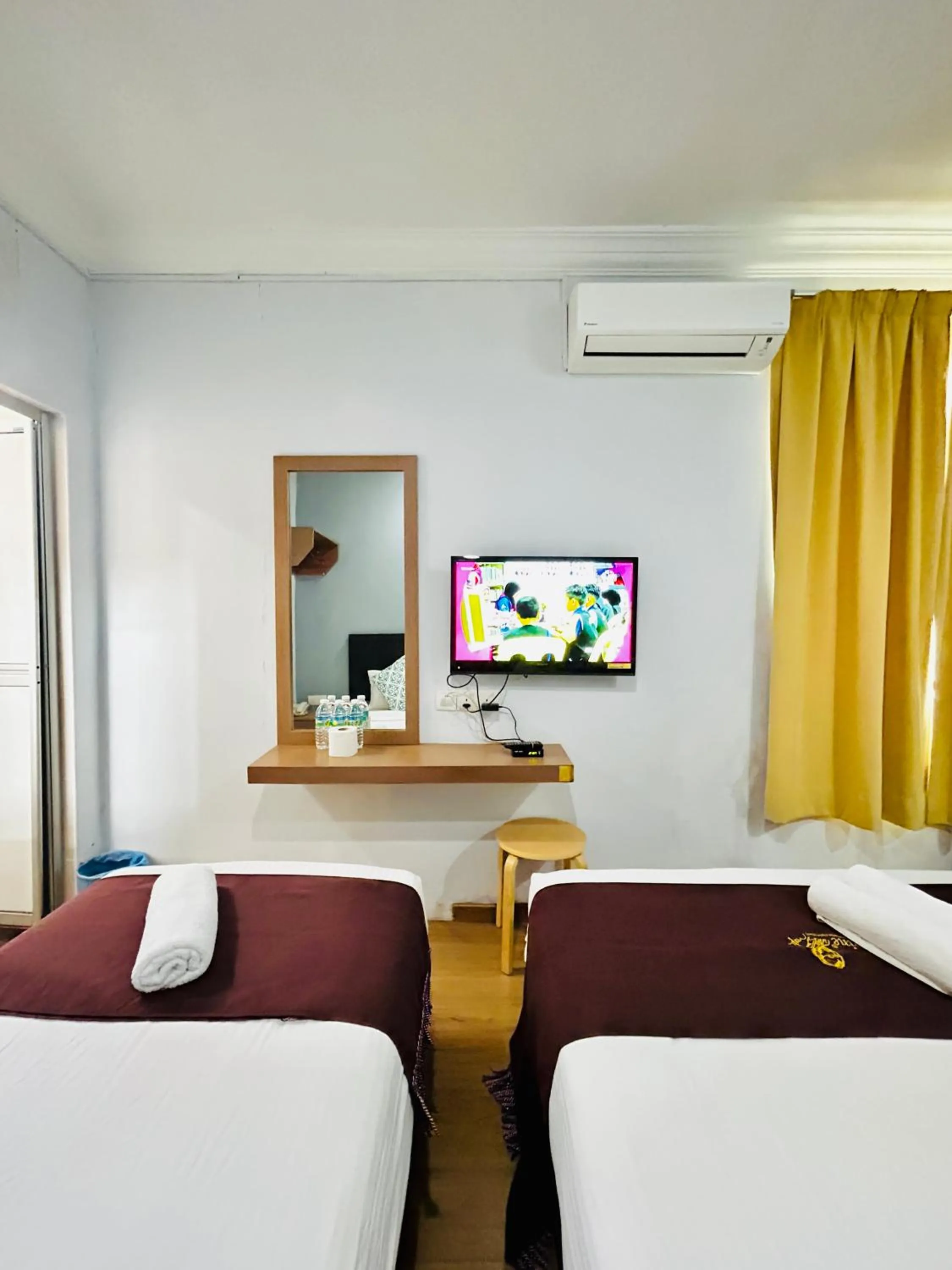 Bed in CHARISMA HOTEL