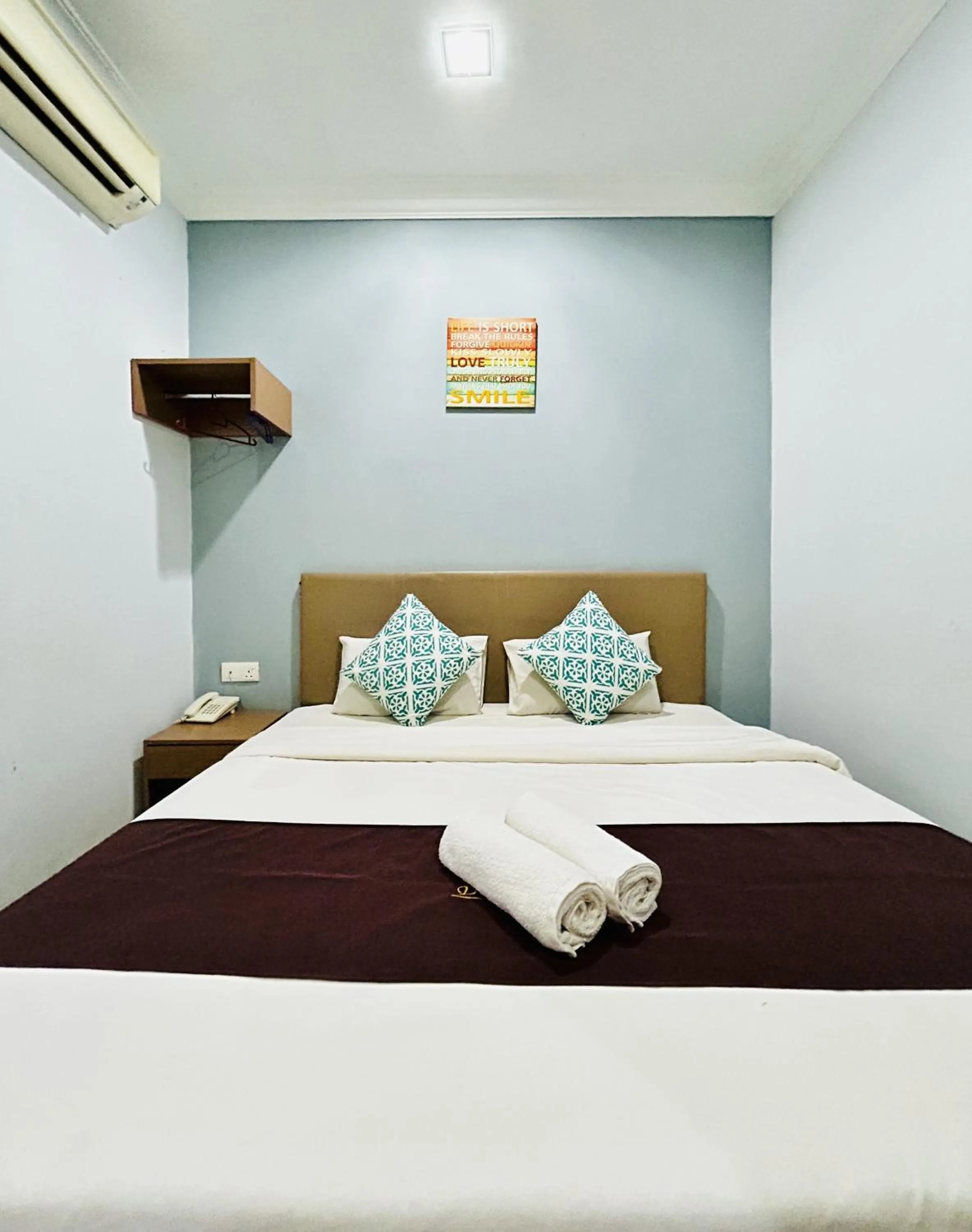 Bed in CHARISMA HOTEL