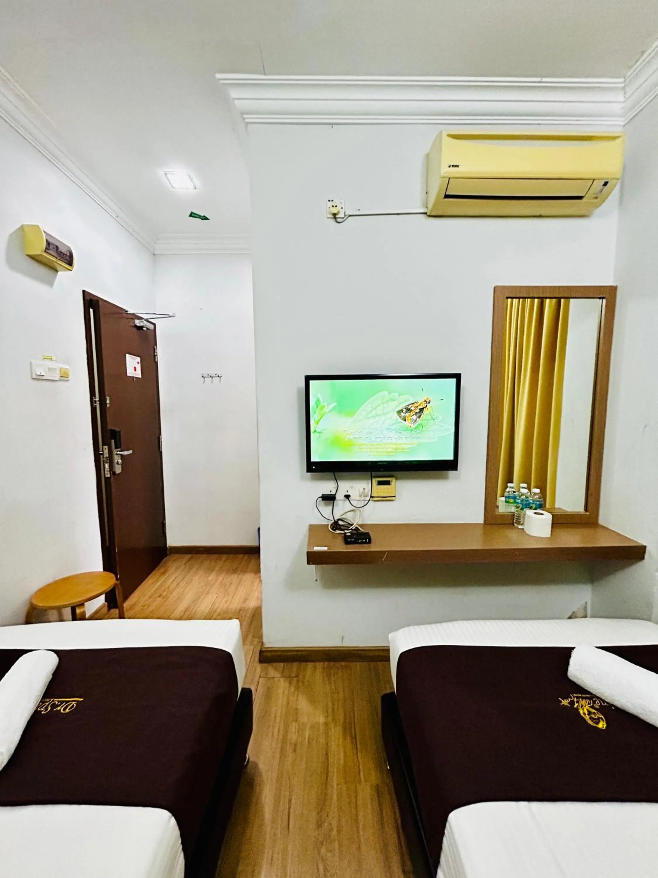 Bed in CHARISMA HOTEL