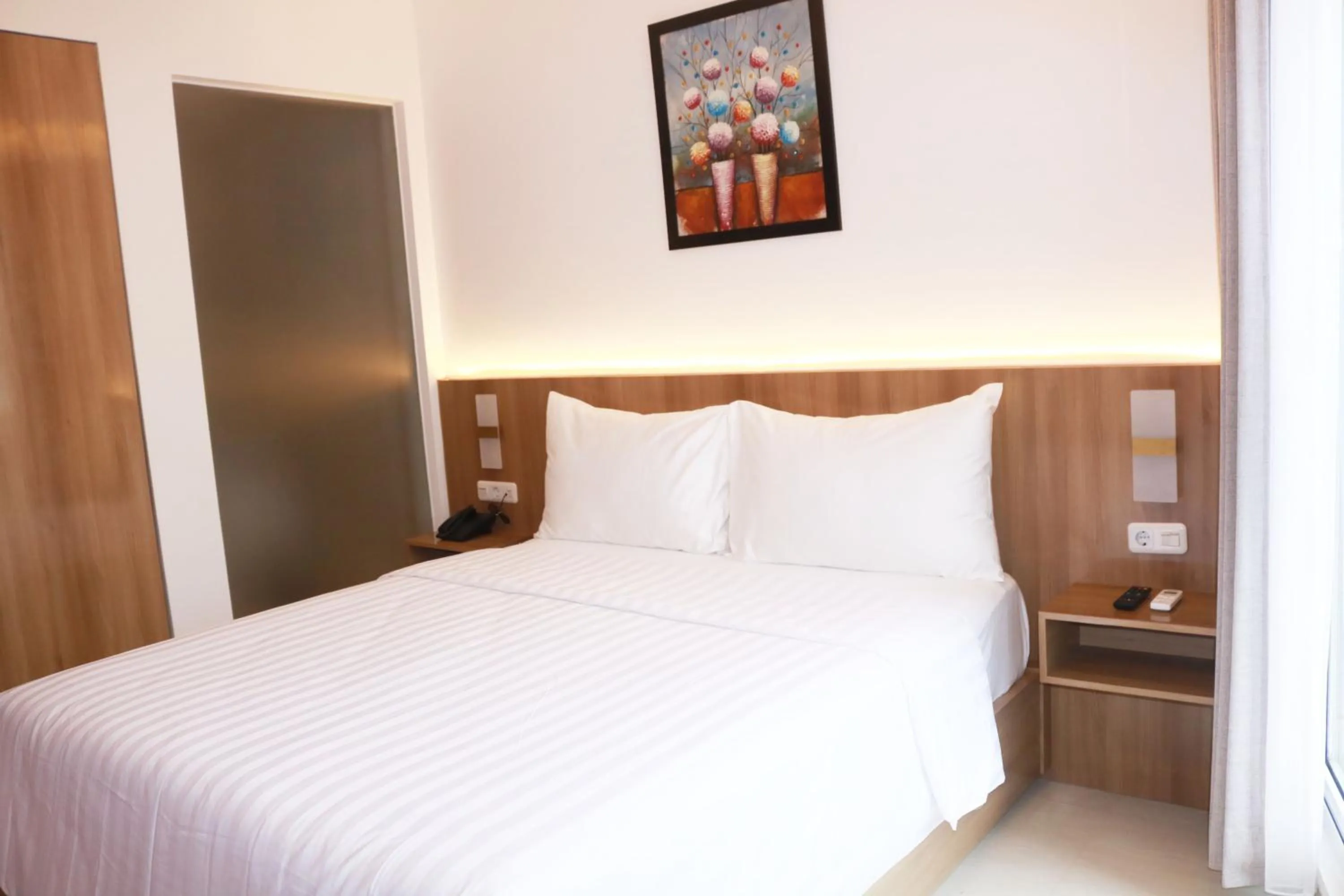 Bed in Surabaya River View Hotel