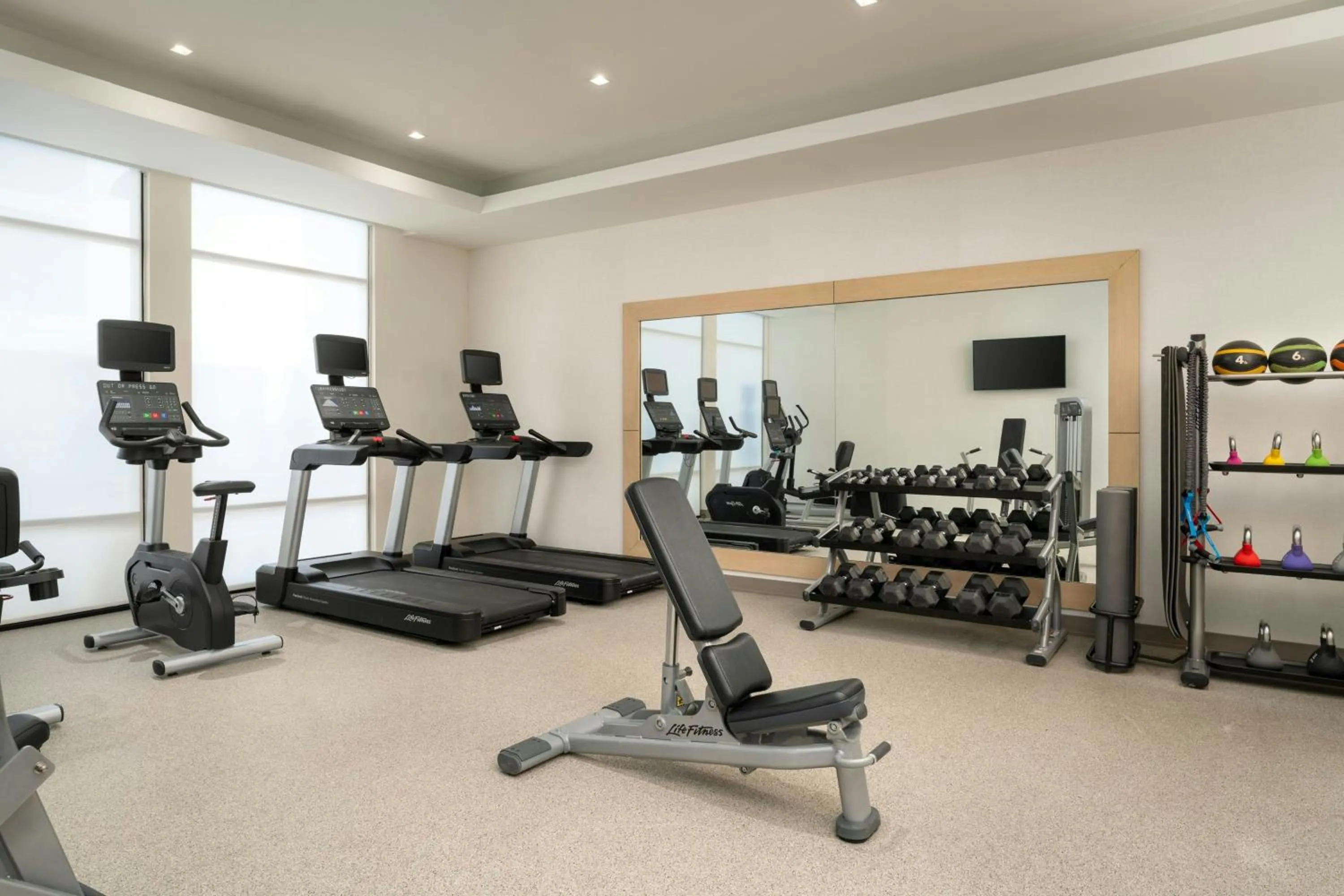 Fitness centre/facilities in SpringHill Suites by Marriott Jacksonville Beach Oceanfront