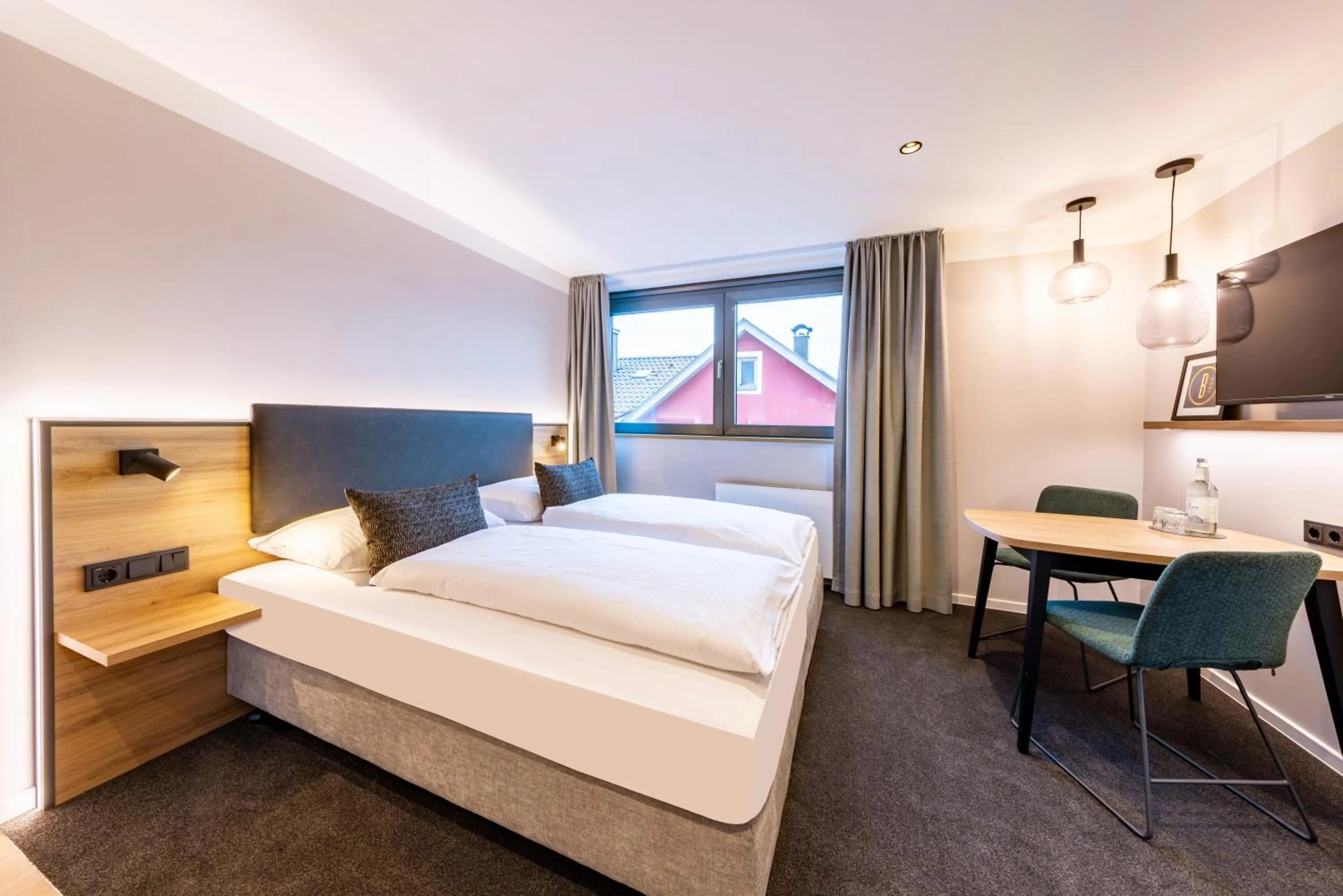 Bed in BOLLWERK Lifestyle Hotel, automatisiertes Hotel mit Self Check In