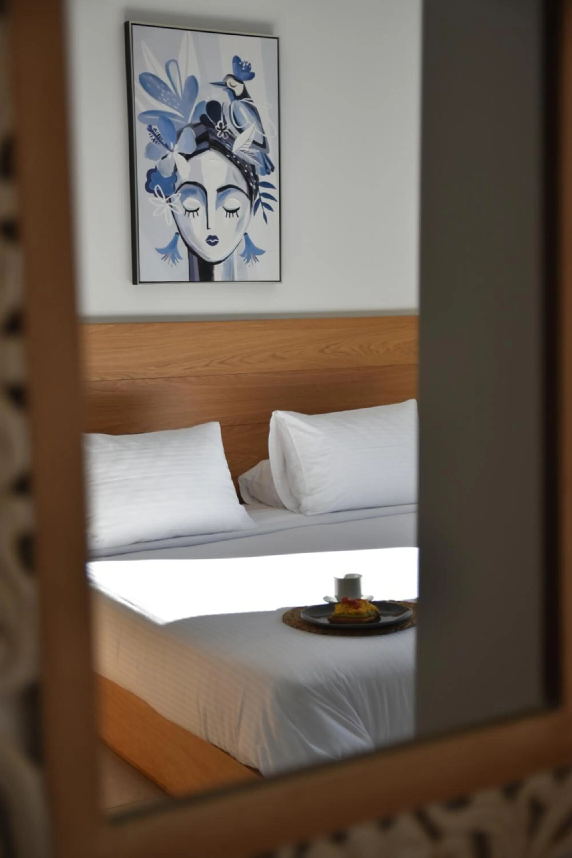 Bed in Mythical Coast Wellness Retreat