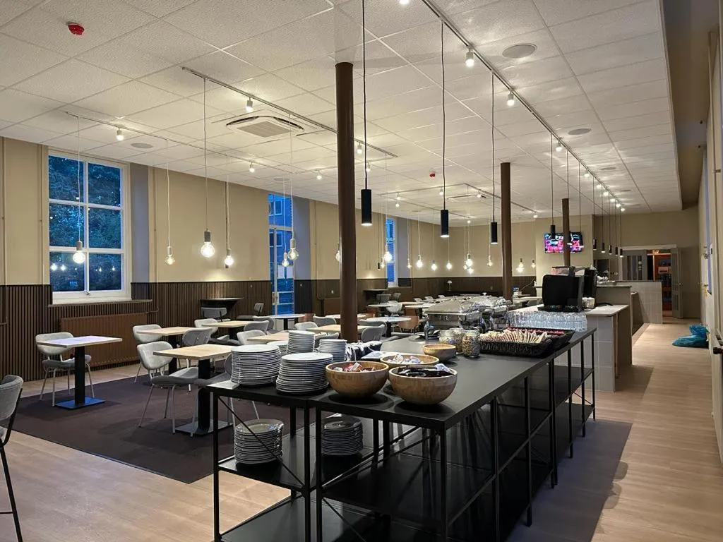 Communal lounge/ TV room in SEPHS Hotel Sittard