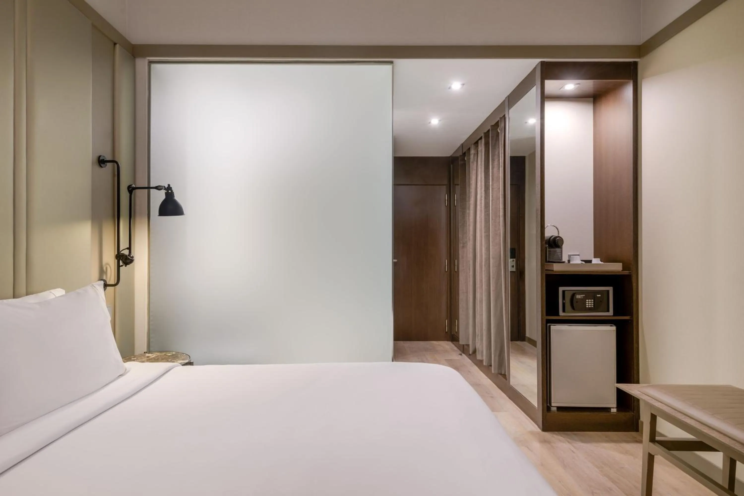 Photo of the whole room, Bed in AC Hotel Recoletos by Marriott