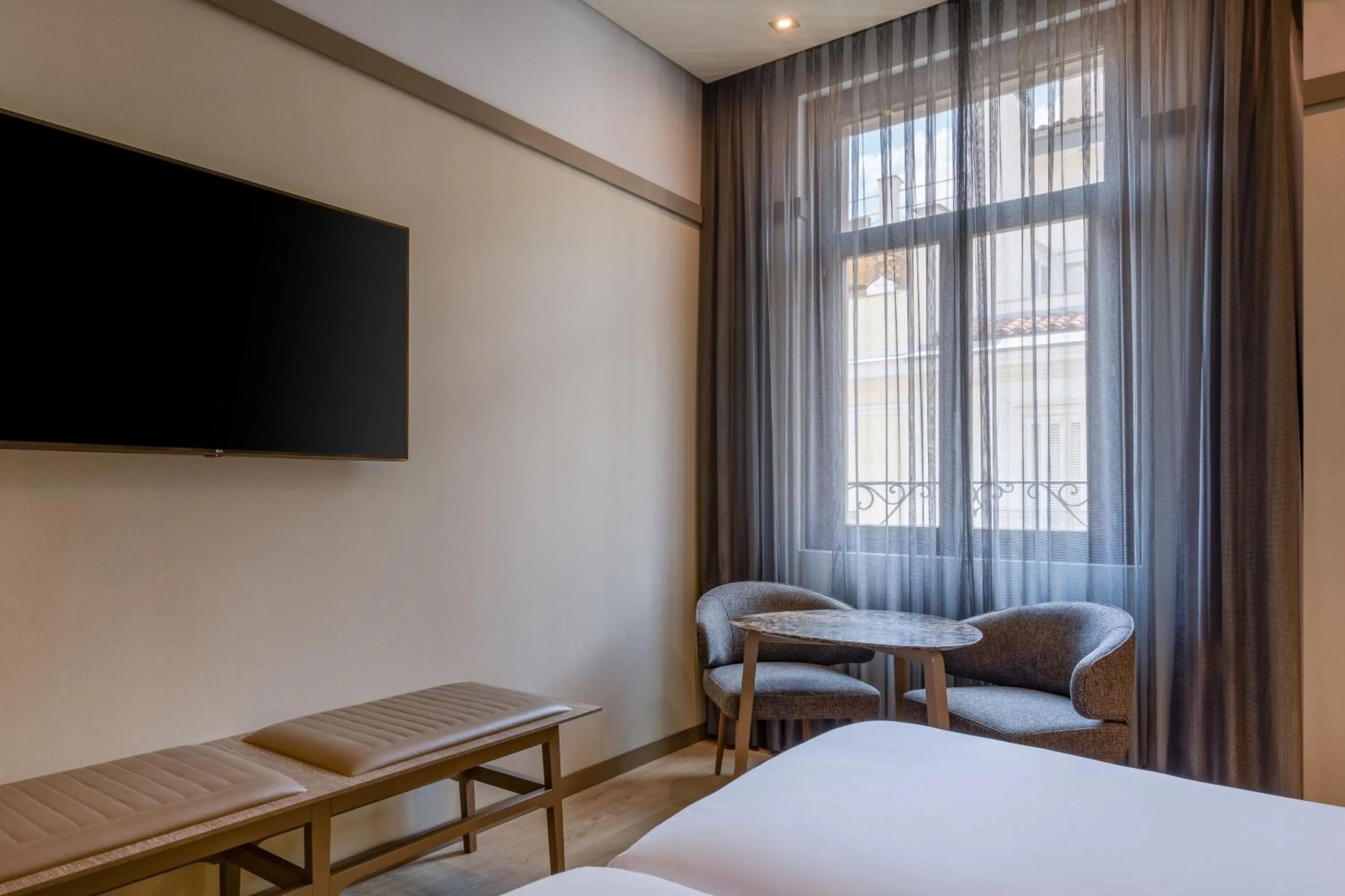 Photo of the whole room, Bed in AC Hotel Recoletos by Marriott