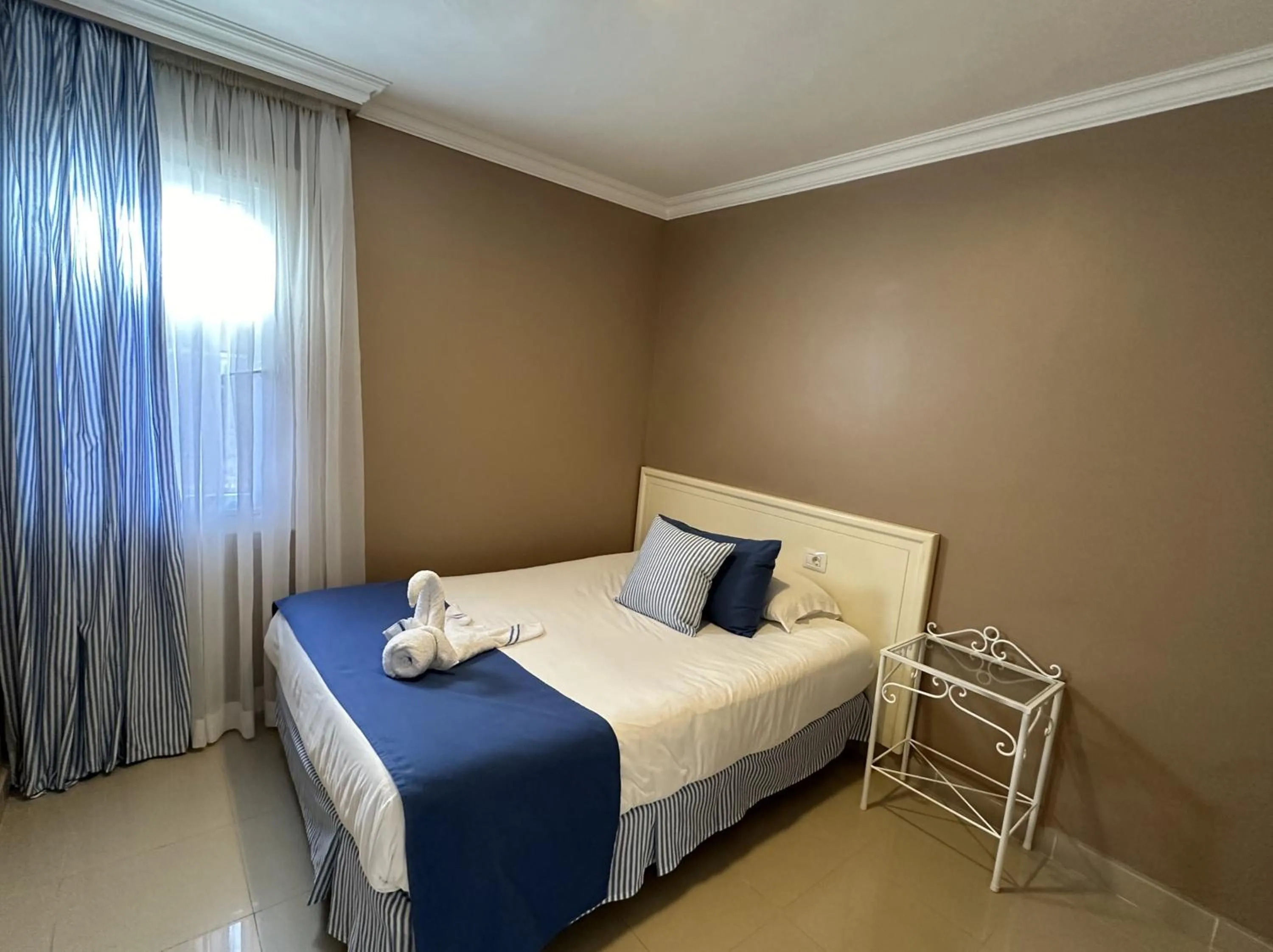 Bedroom, Bed in RF La Quinta Park Suites