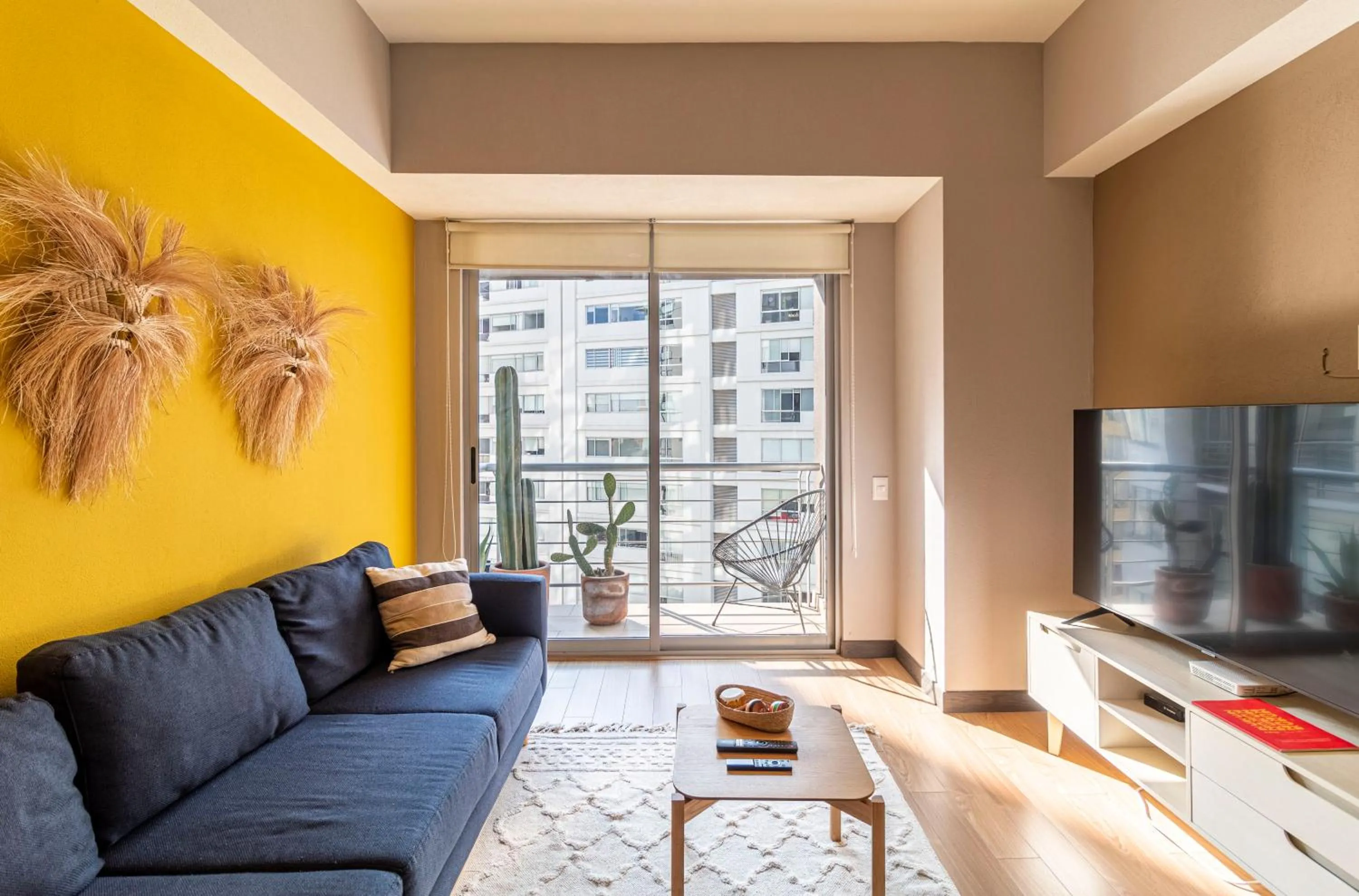 Communal lounge/ TV room in Casa Vive Grand by Kukun