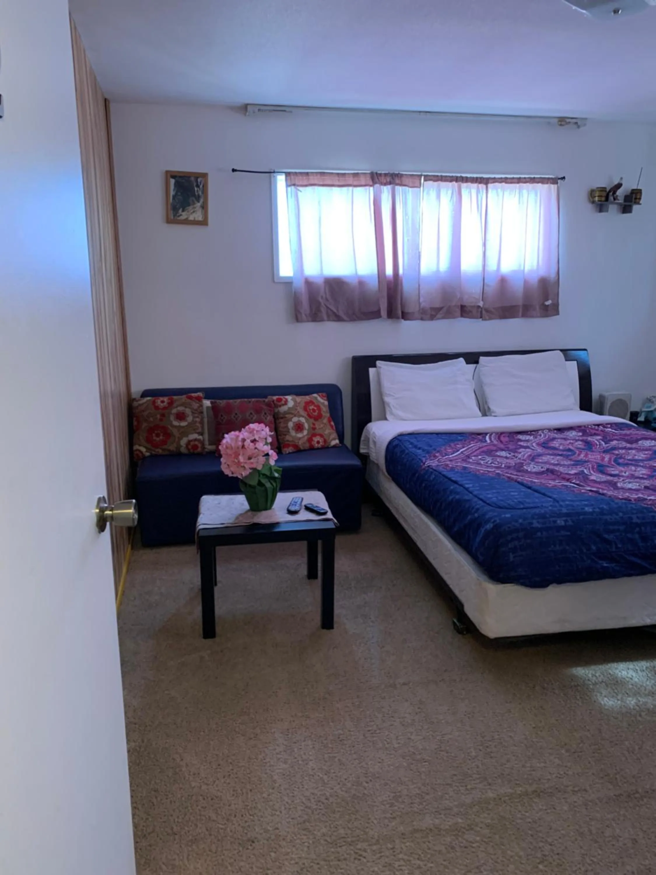 Bed in The Yellow Penthouse LLC