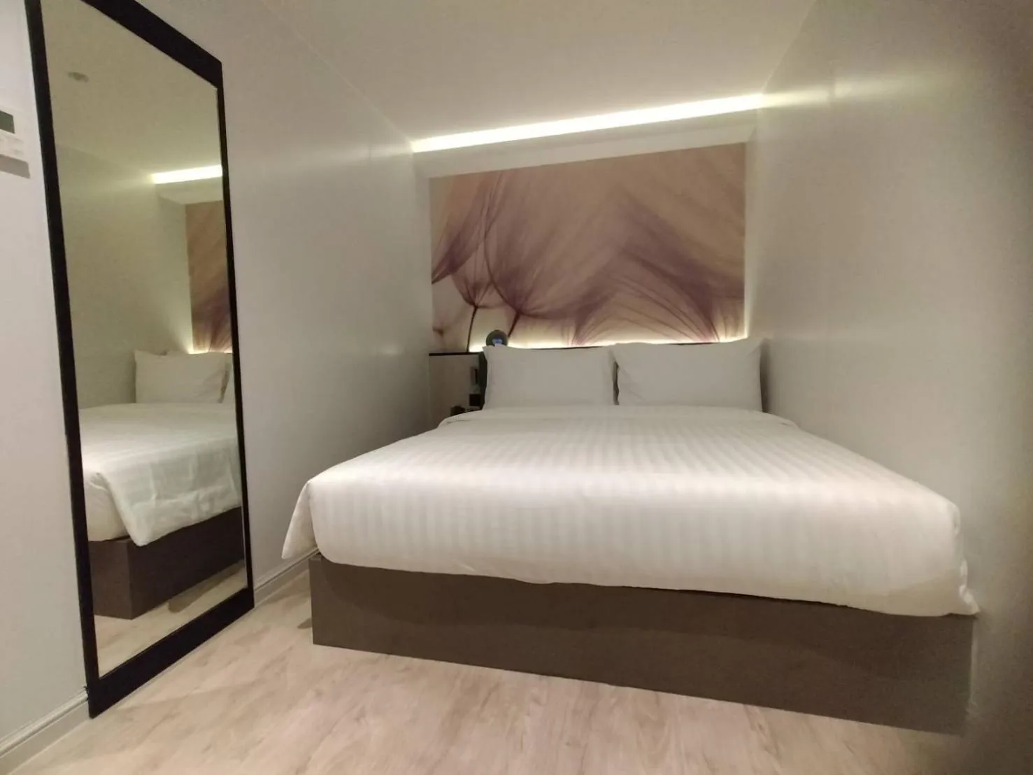 Bed in Karnyapha Hotspring hotel